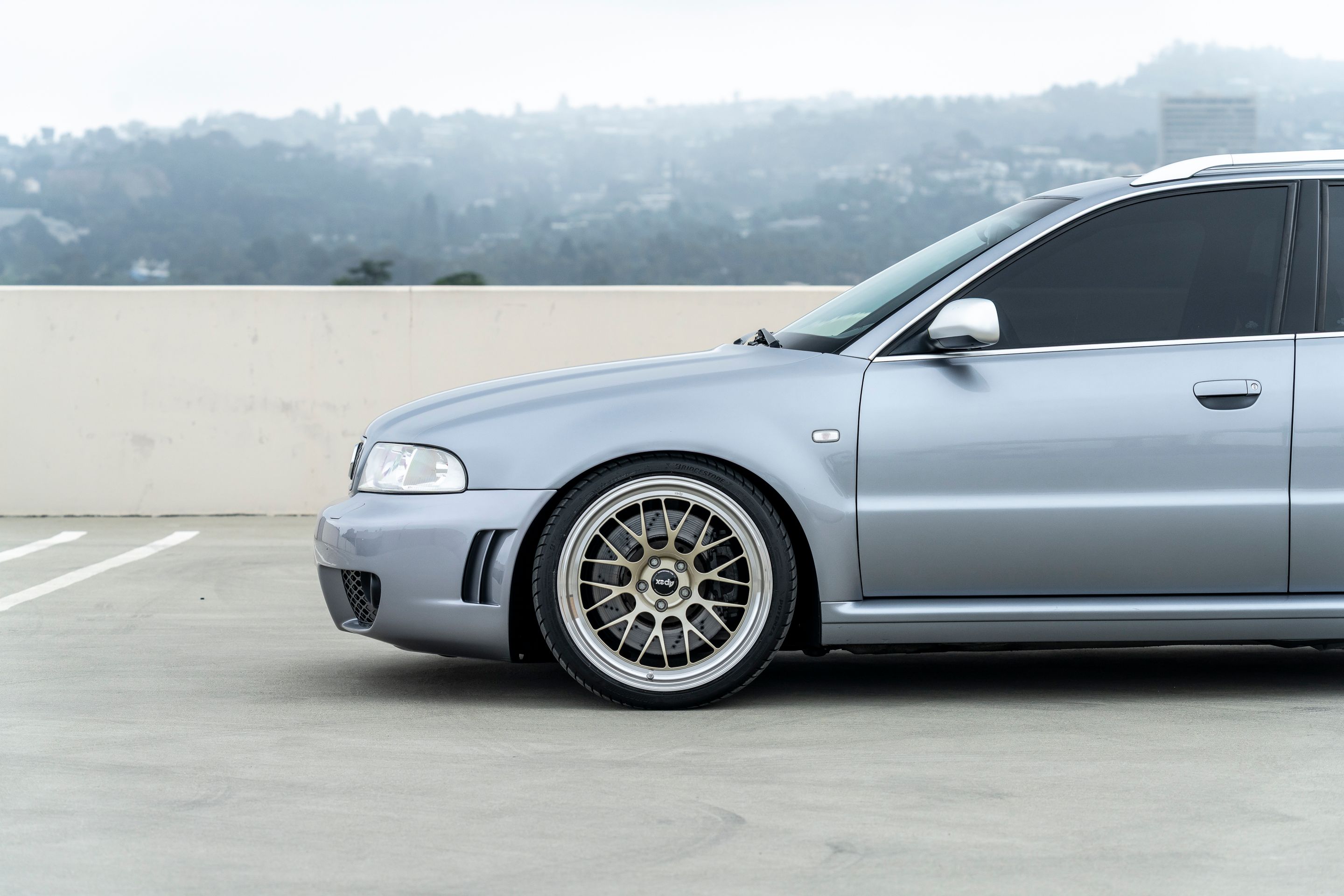Silver Audi B5 RS 4 Avant/Wagon with 19" ML-10RT Apex wheels in Machined Lip Gloss Motorsport Gold