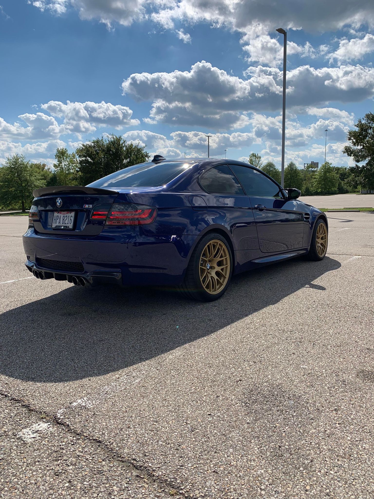 Blue BMW E92 Coupe M3 with 18" EC-7R Apex wheels in Satin Gold