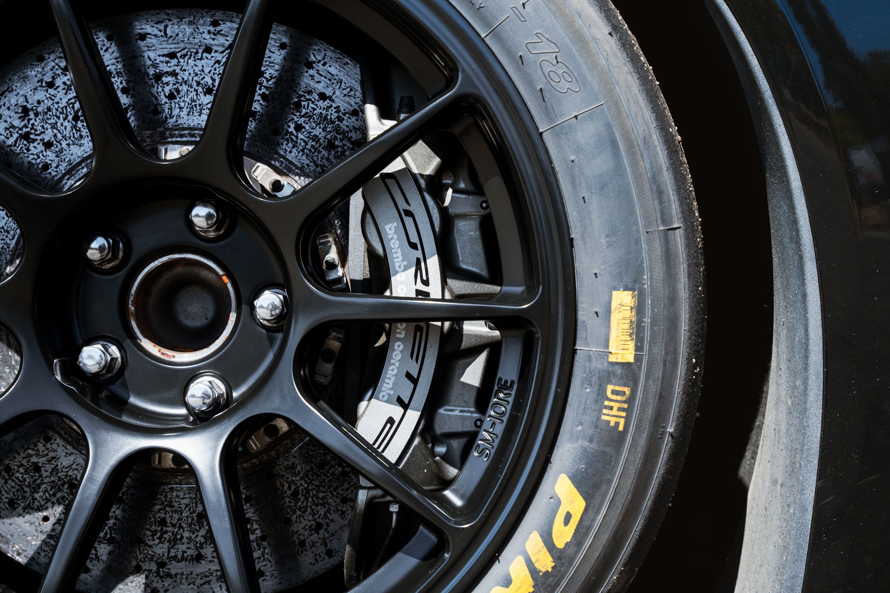 Black Chevrolet C7 Corvette Z06 with 18" SM-10RE Apex wheels in Satin Black