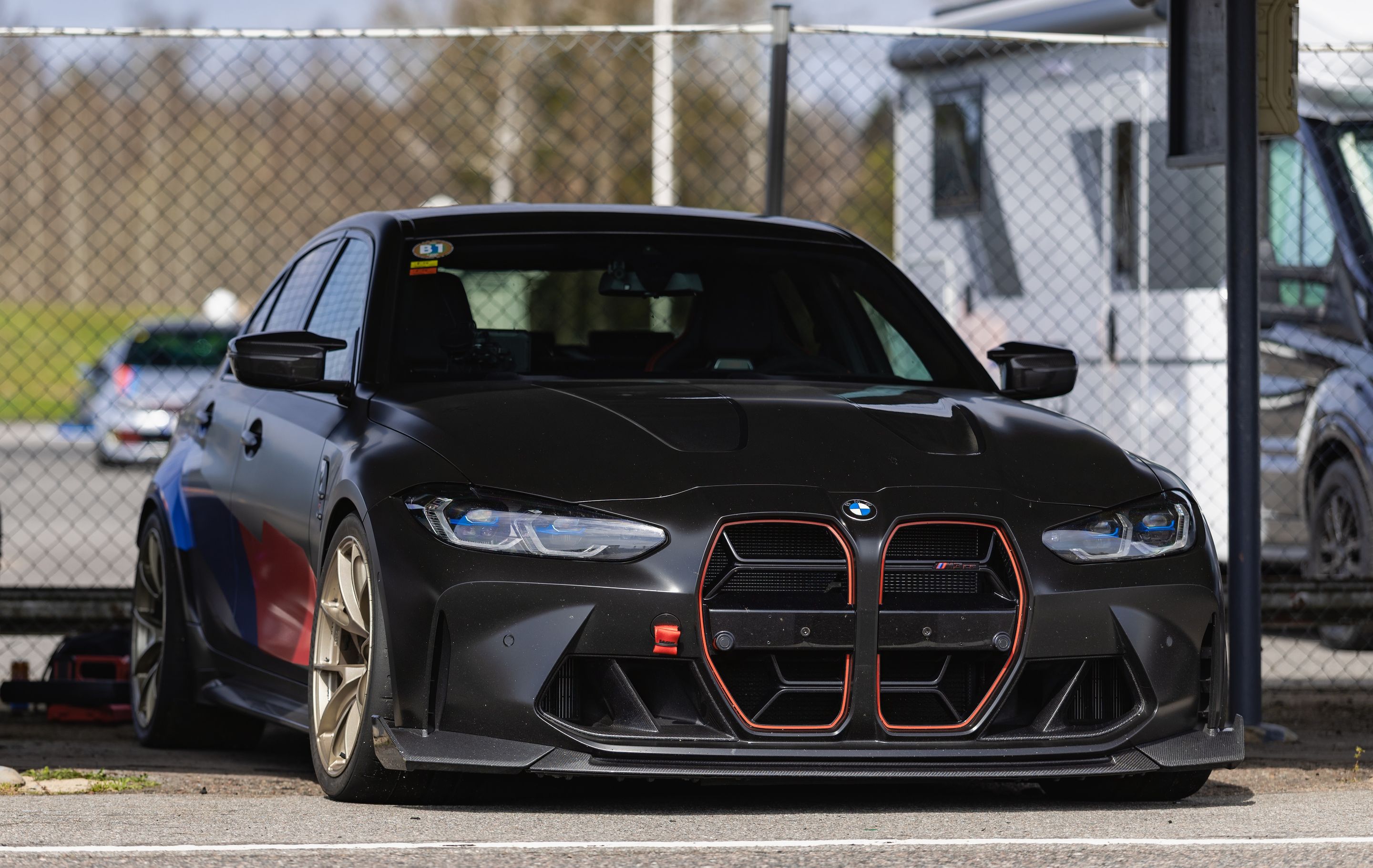 Black BMW G80 M3 with 19" VS-5RS Apex wheels in Motorsport Gold