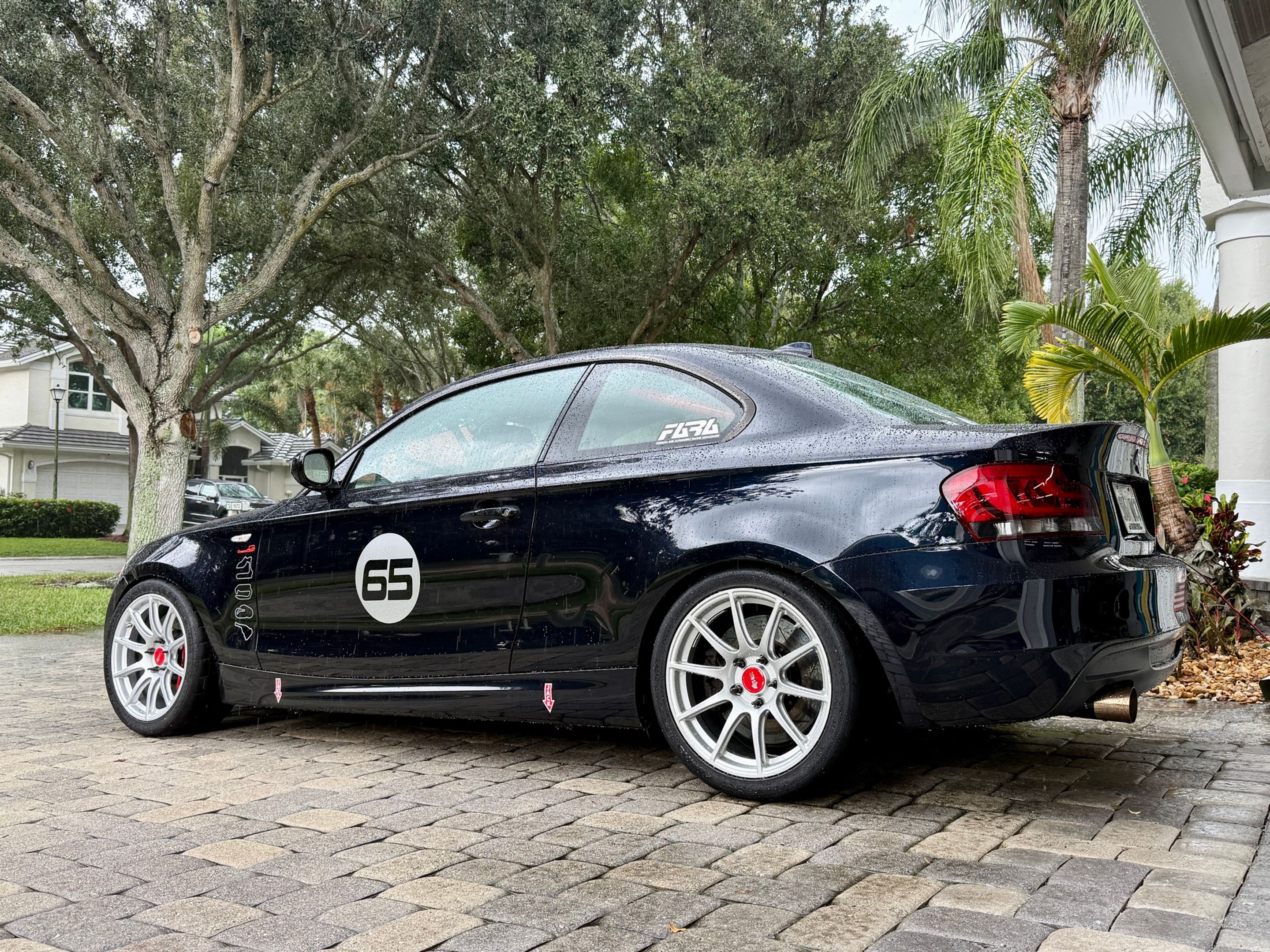 Black BMW E82 Coupe 1 Series with 18" SM-10 Apex wheels in Race Silver