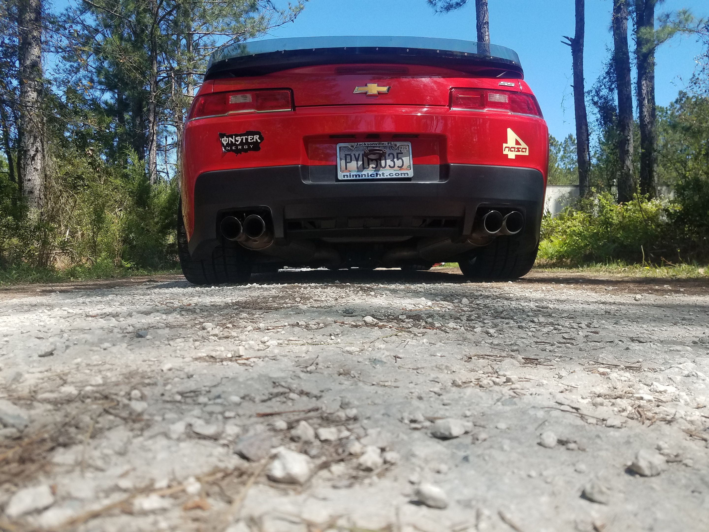Red Chevrolet 5th Gen Camaro SS 1LE with 18" SM-10 Apex wheels in Race Silver