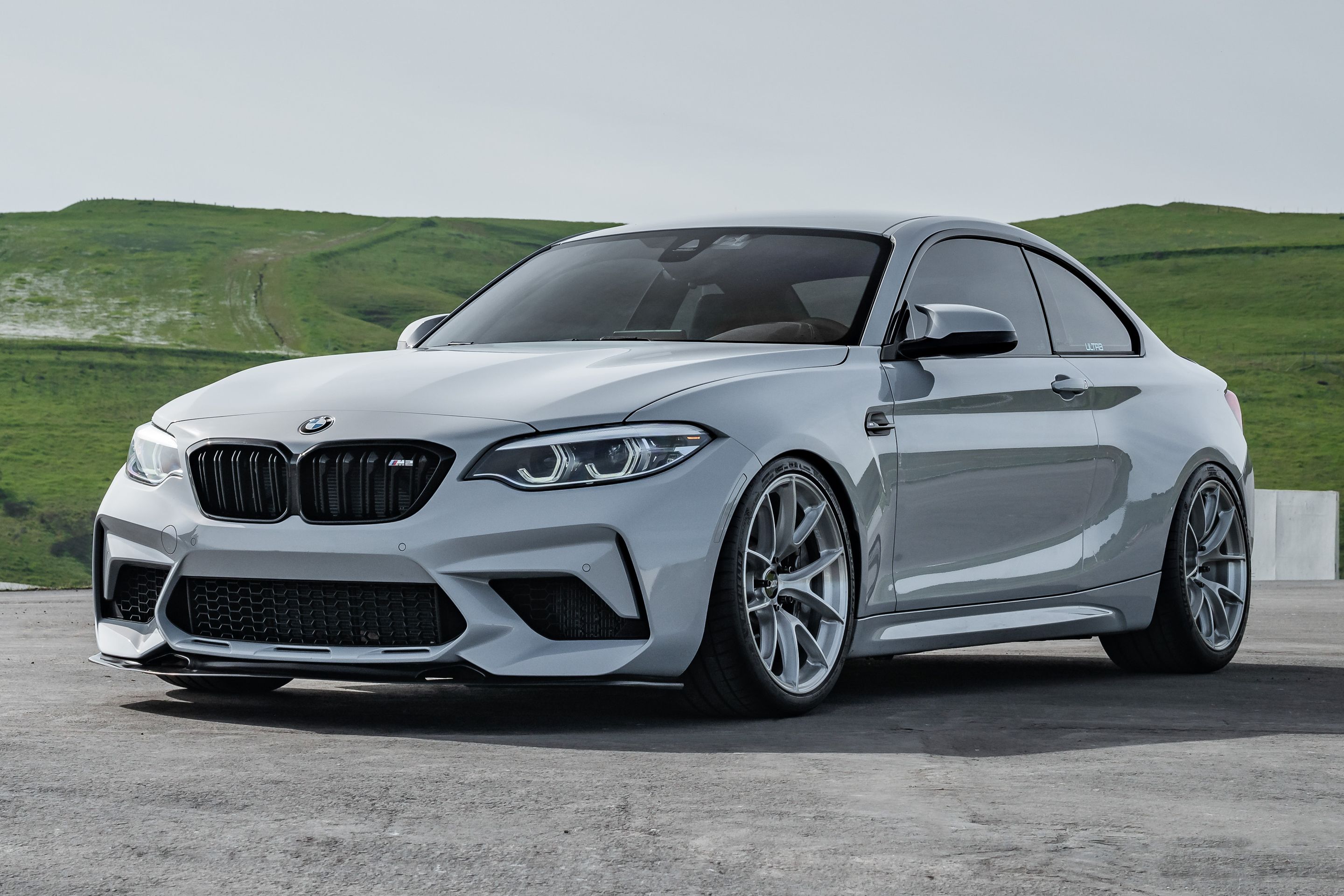 Silver BMW F87 M2 with 19" VS-5RS Apex wheels in Brushed Clear