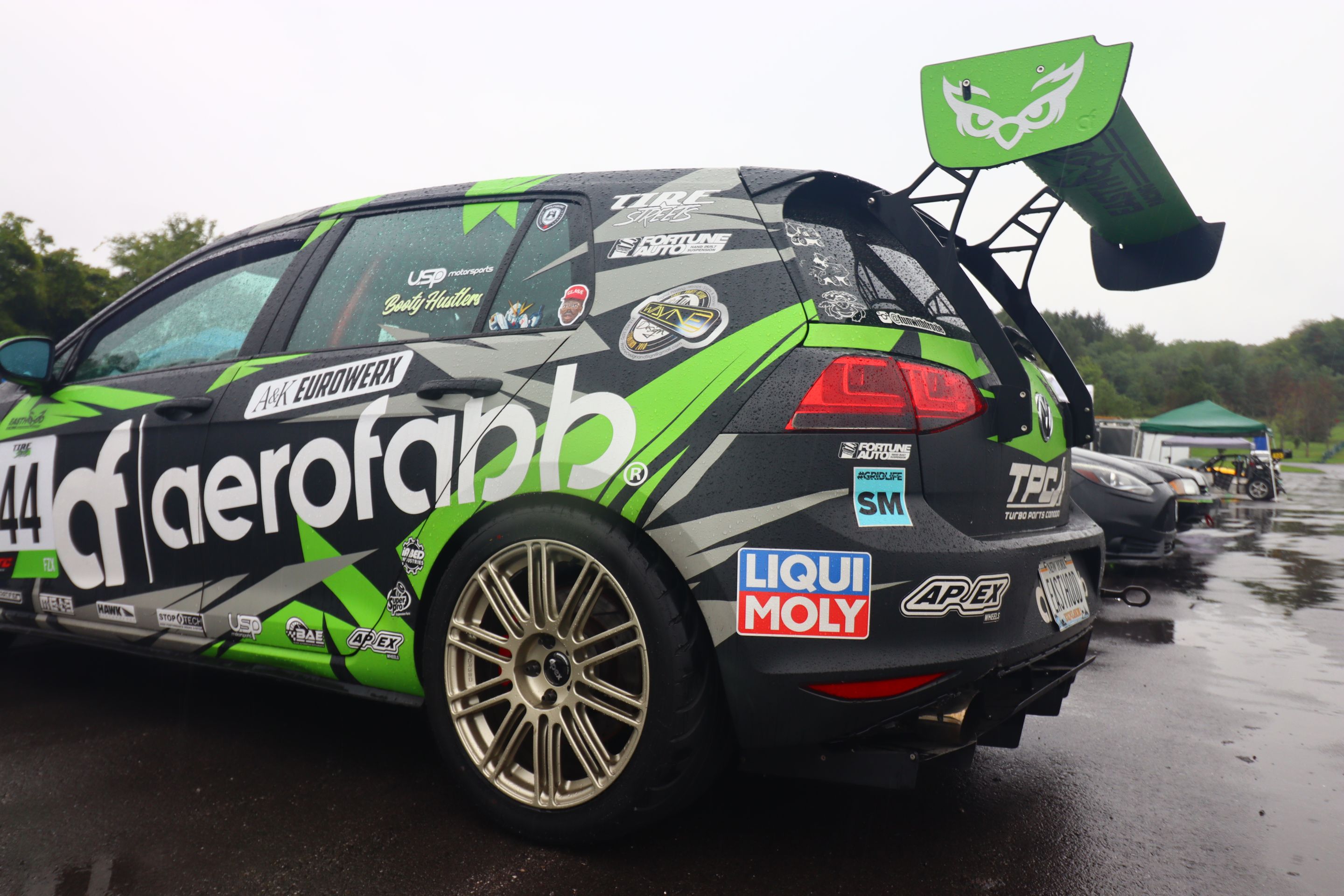 Race Livery VW MK7 GTI with 18" TC-10RT Apex wheels in Motorsport Gold