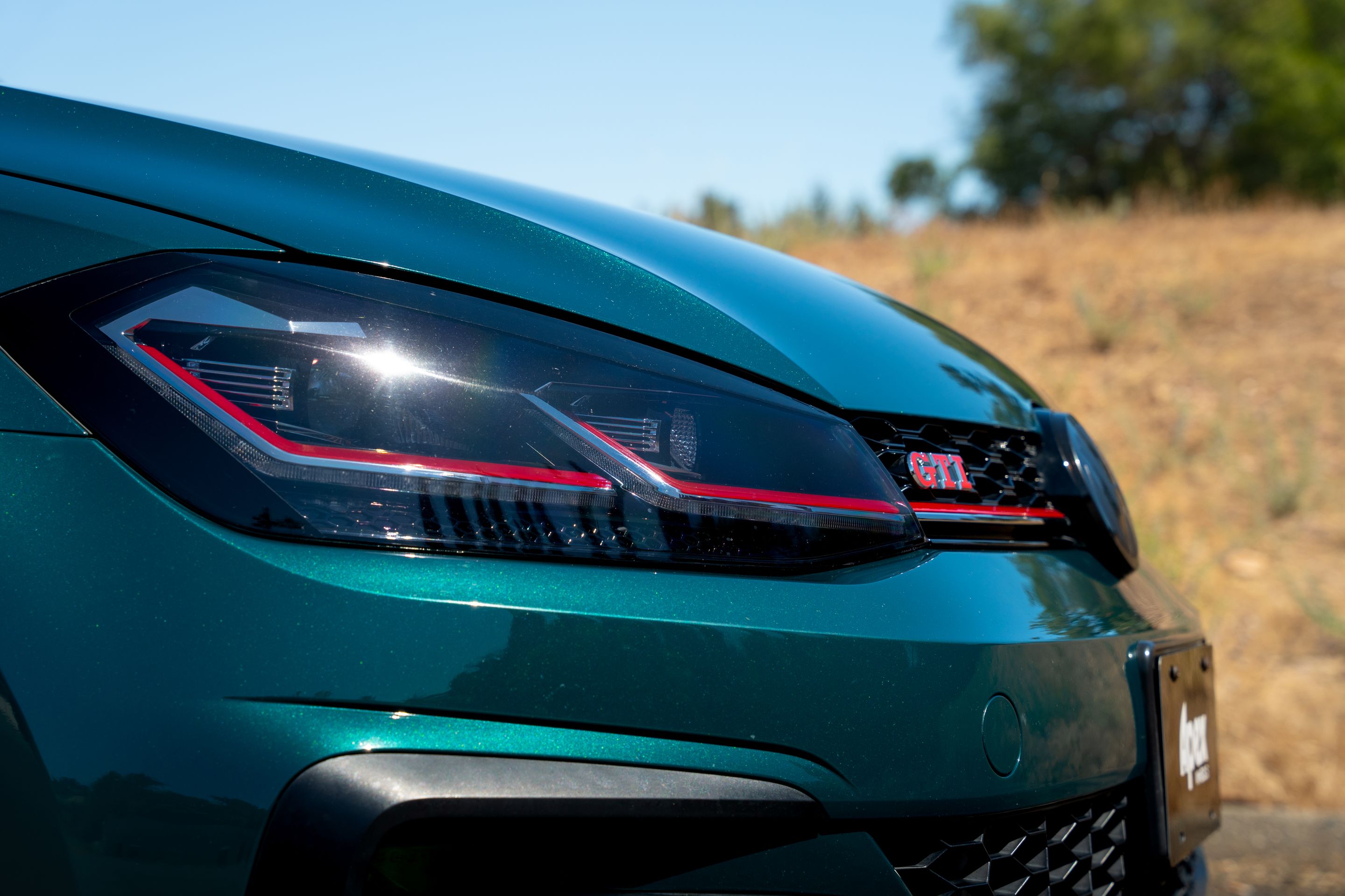 Green VW MK7 GTI with 17" VS-5RS Apex wheels in Brushed Clear