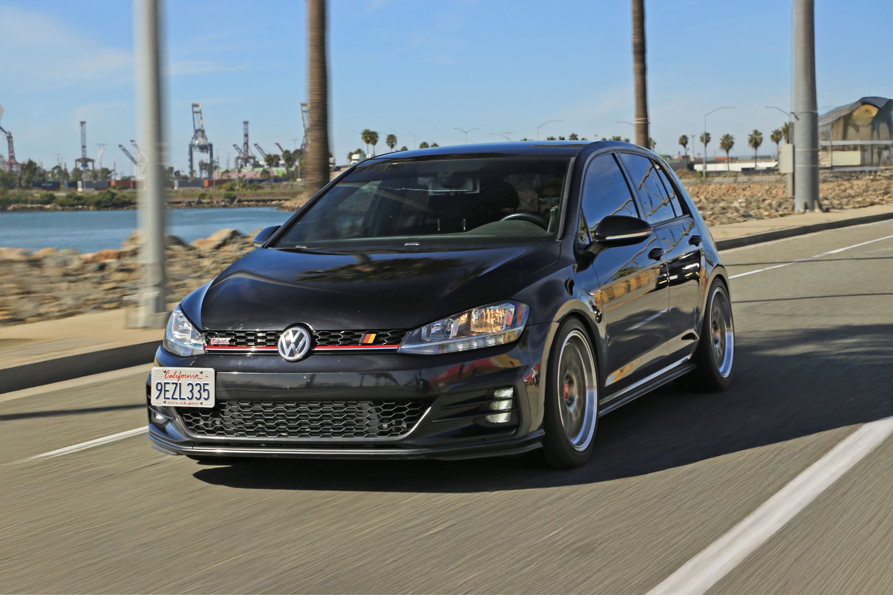 Black VW MK7 GTI with 18" ML-10RT Apex wheels in Machined Lip Gloss Motorsport Gold
