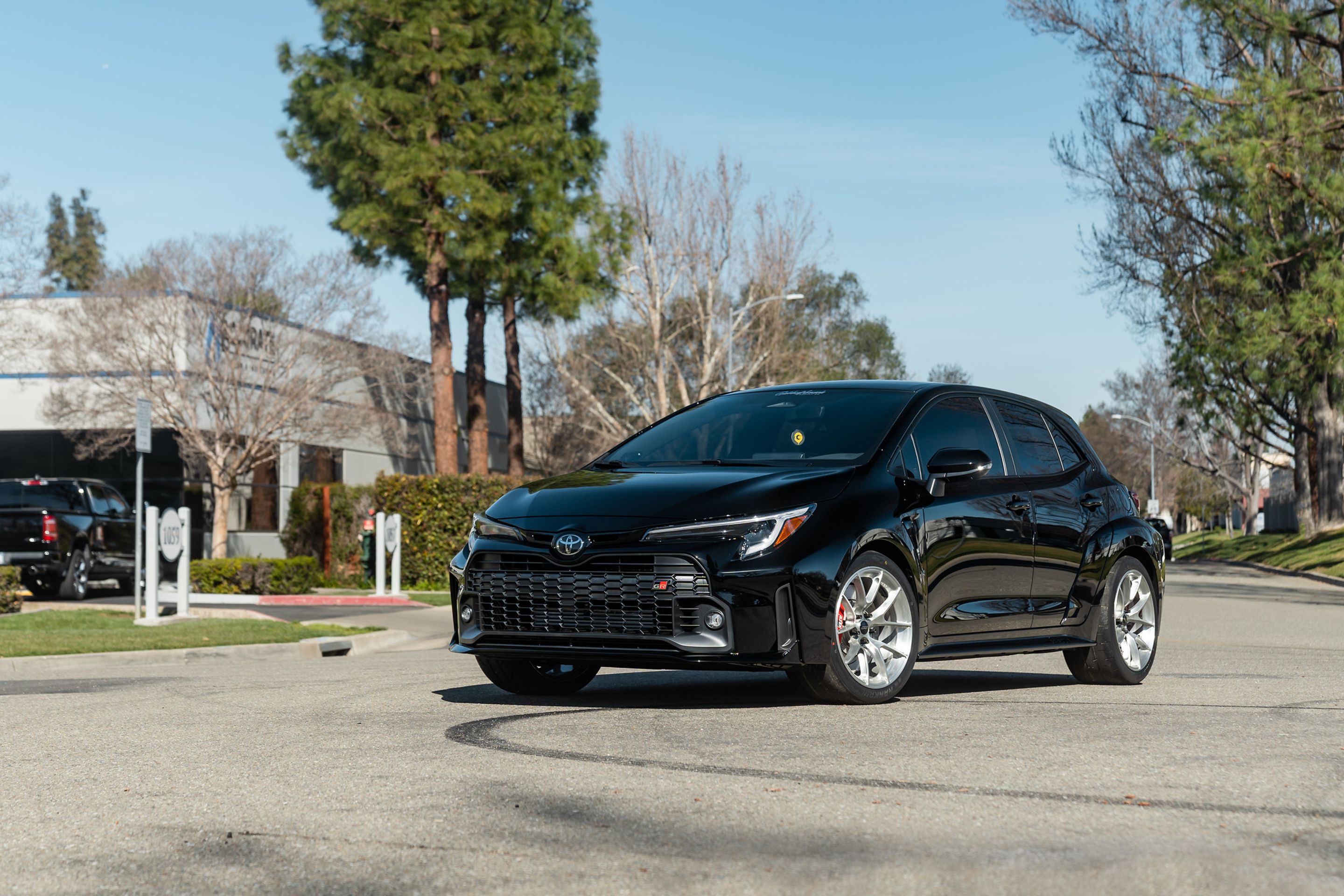 Black Toyota GR Corolla with 18" VS-5RS Apex wheels in Brushed Clear