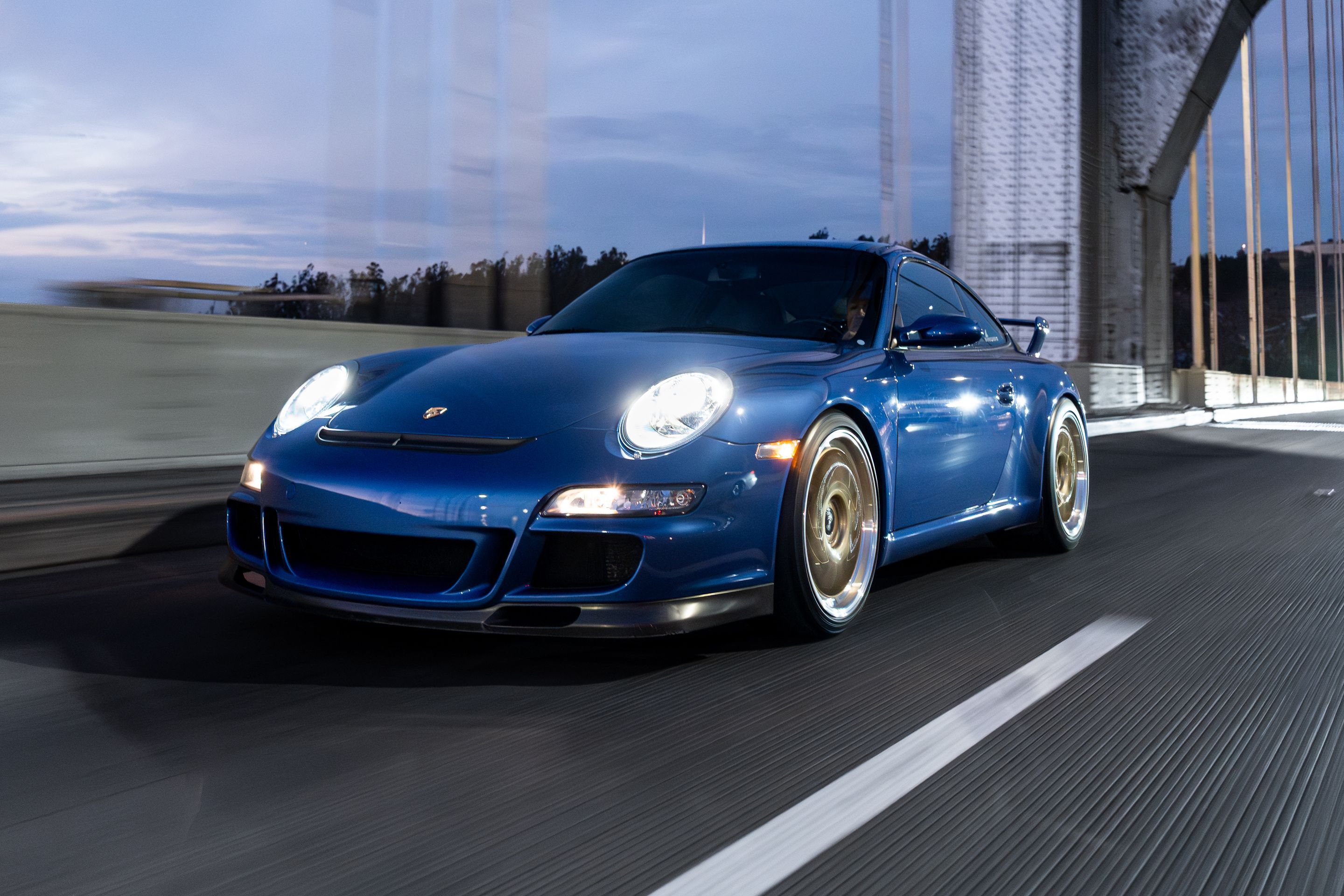 Blue Porsche 911 997 GT3 with 19" TEST-M Apex wheels in Machined Lip Gloss Motorsport Gold