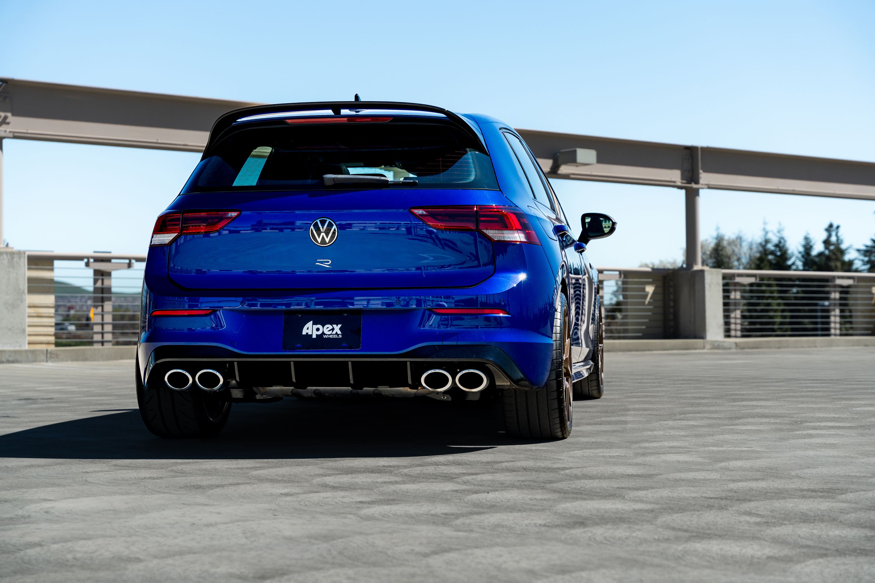 Blue VW MK8 Golf R with 18" VS-5 Apex wheels in Satin Bronze