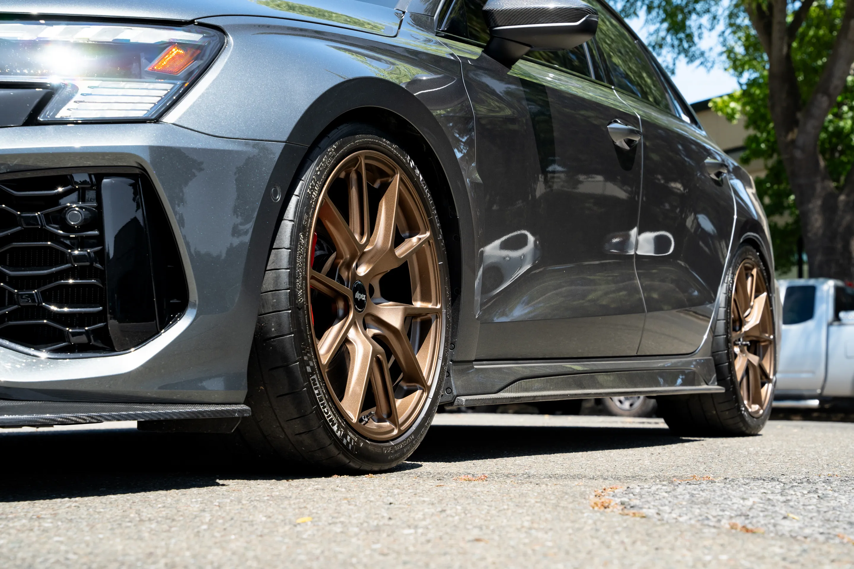 Grey Audi 8Y RS 3 with 18" VS-5 Apex wheels in Satin Bronze