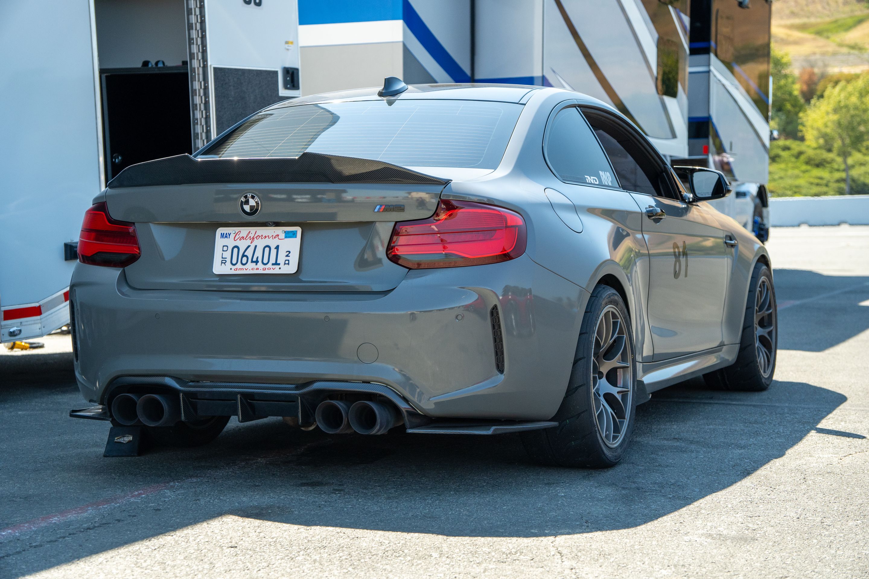 Grey BMW F87 M2 with 18" EC-7 Apex wheels in Anthracite