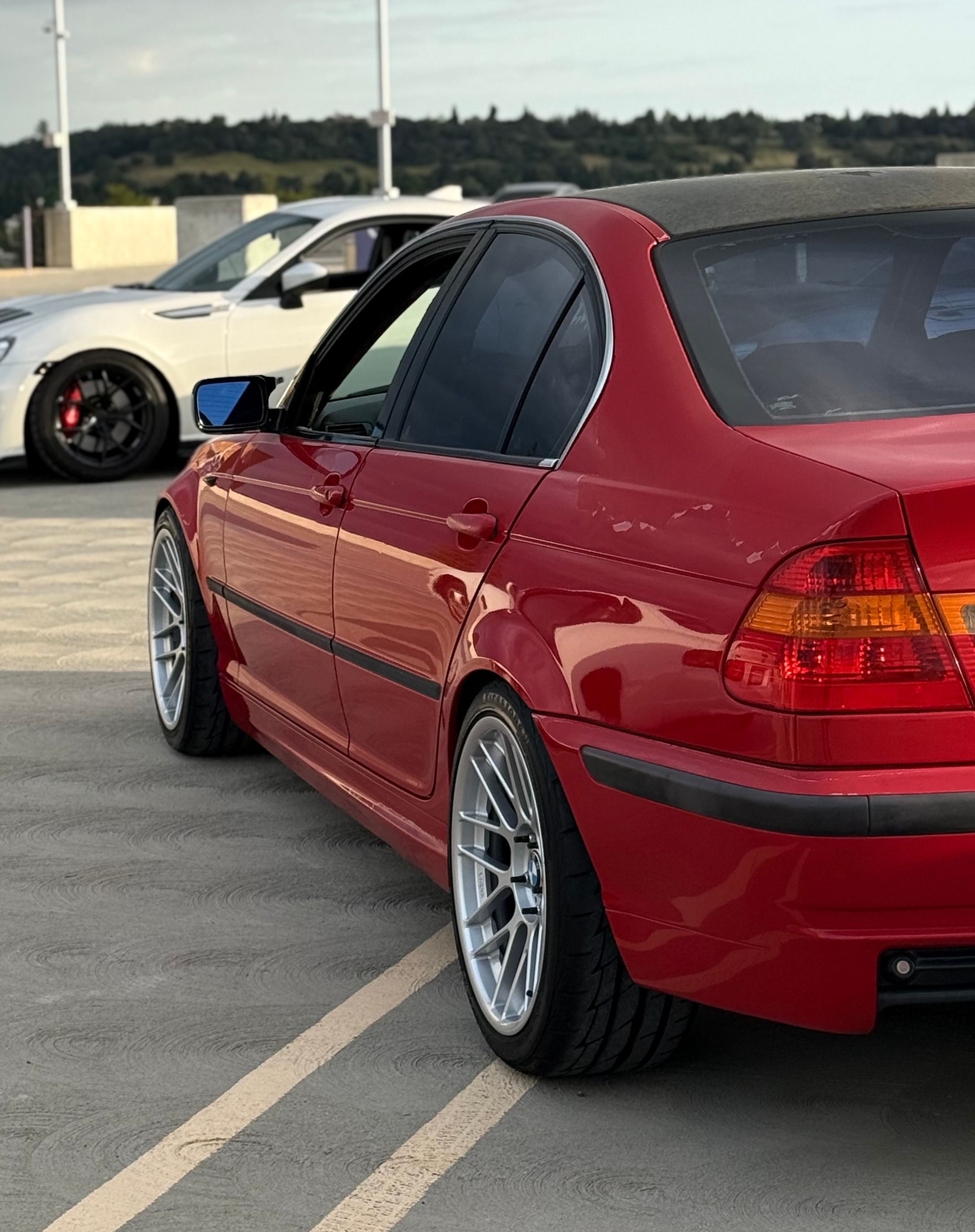Red BMW E46 3 Series with 18" ARC-8RT Apex wheels in Race Silver