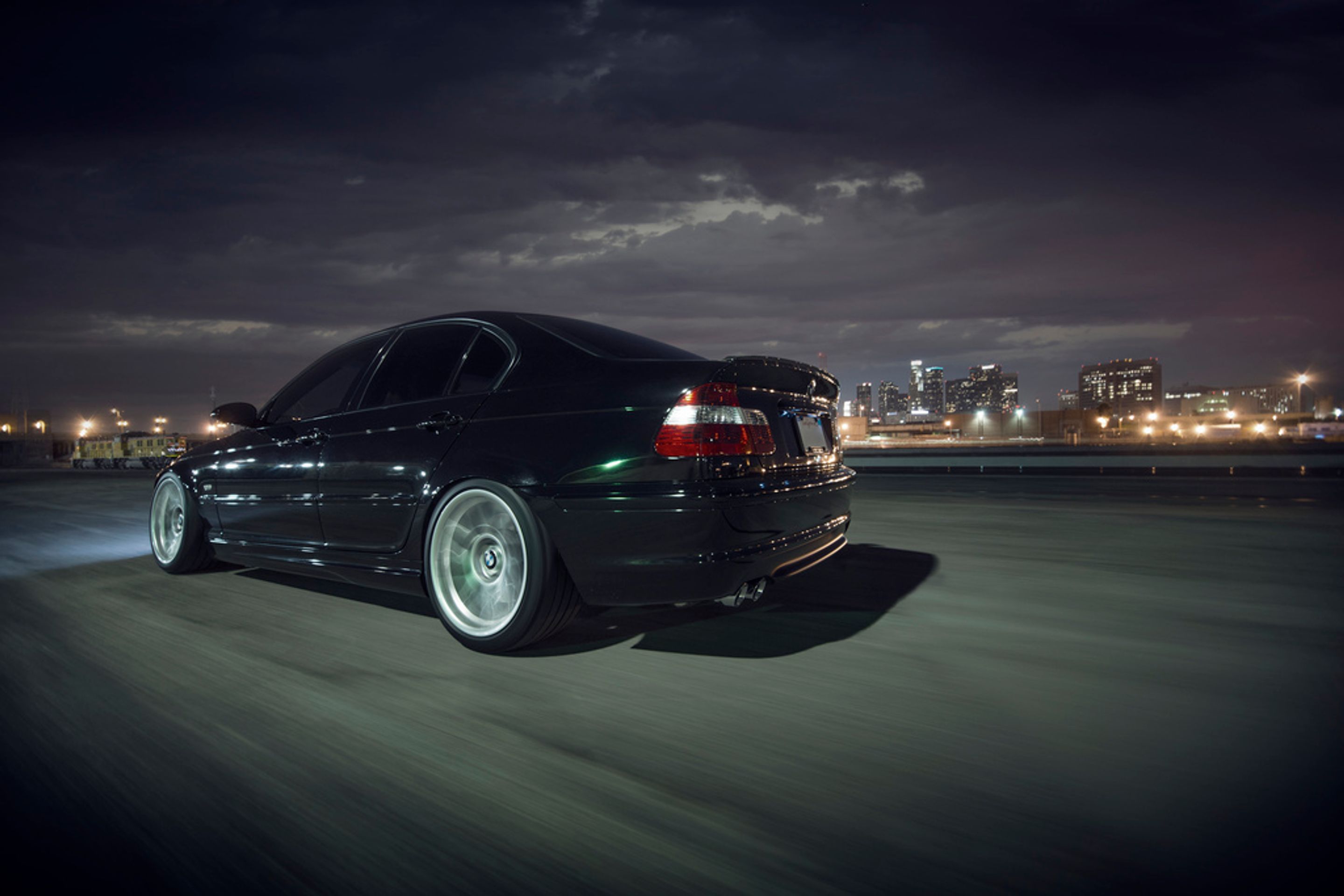 Black BMW E46 3 Series with 18" ARC-8 Apex wheels in Hyper Silver