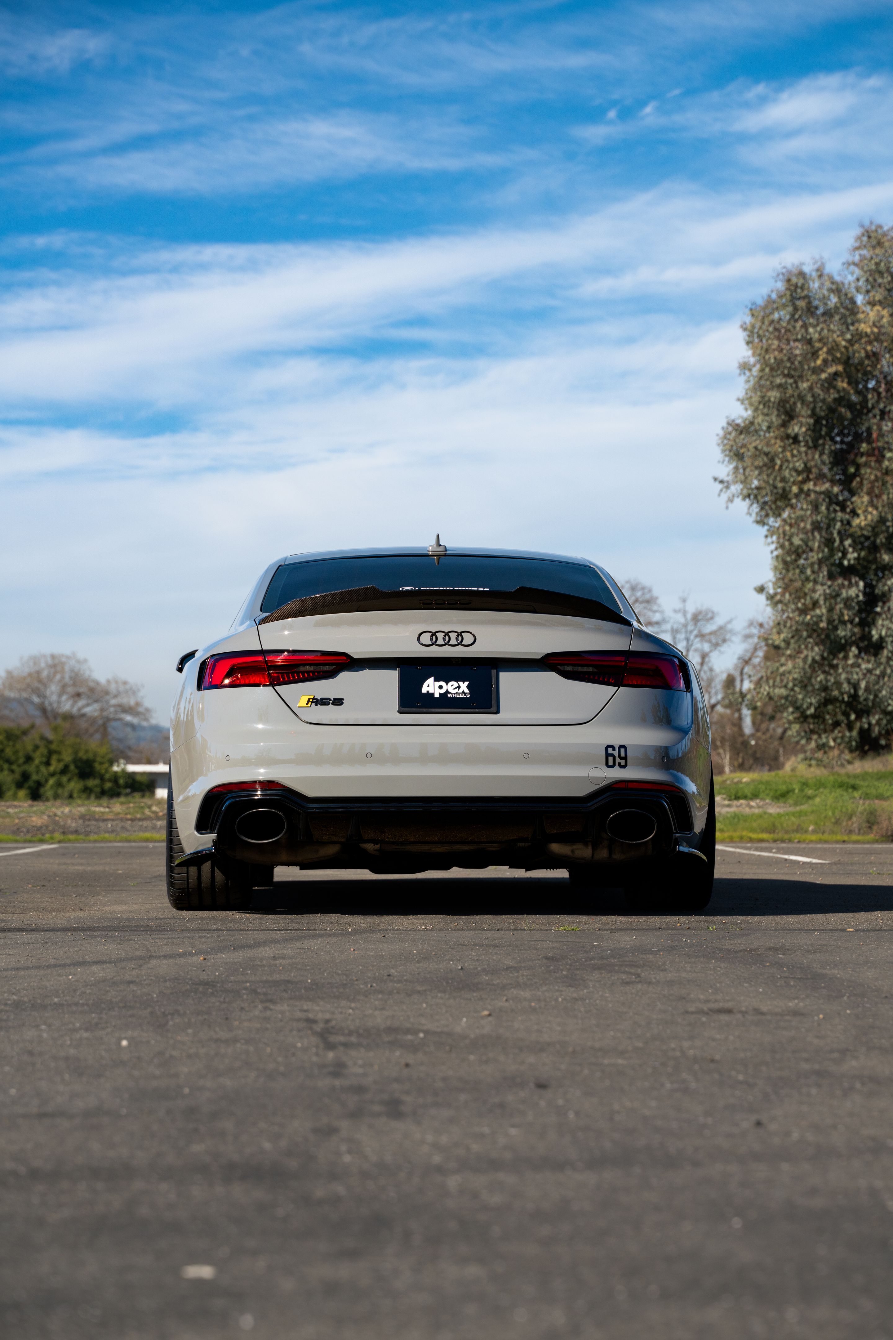 Grey Audi B9 RS 5 Coupe with 20" VS-5RS Apex wheels in Motorsport Gold