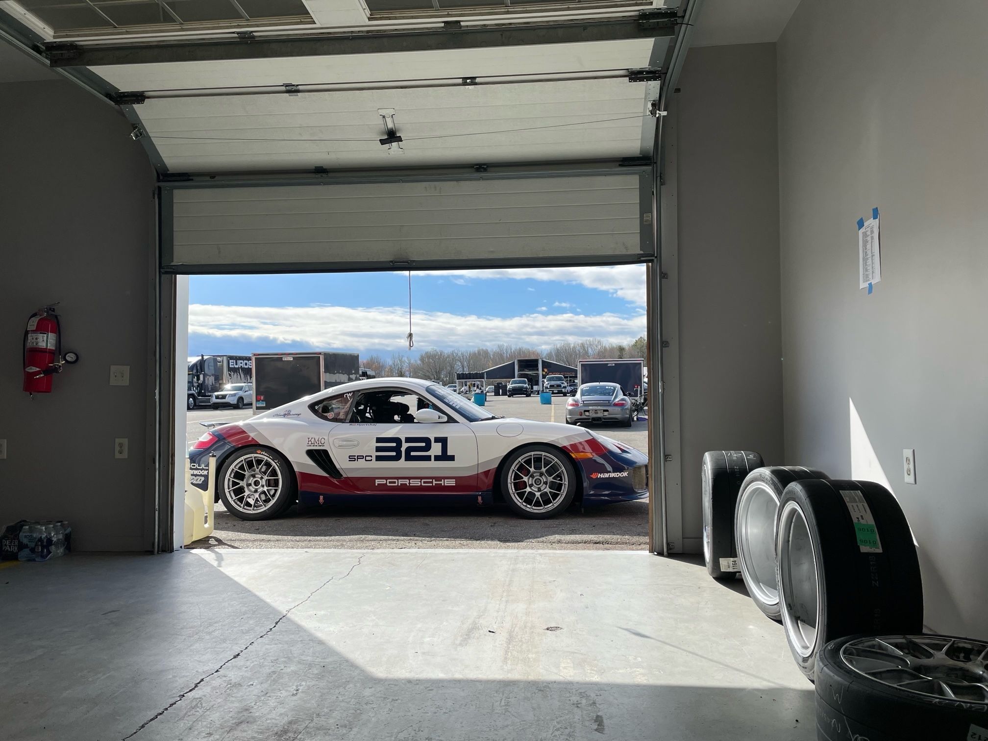 White Porsche 987 Spec Cayman (SPC) with 18" EC-7RS Apex wheels in Race Silver