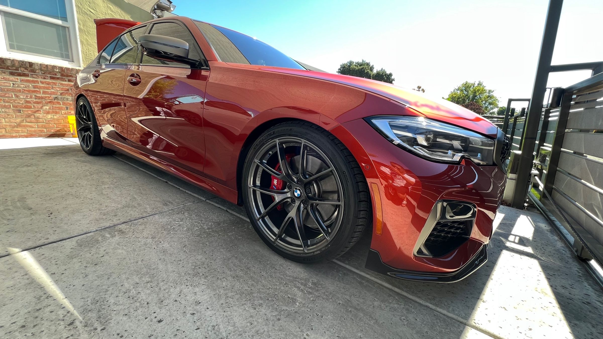 Orange BMW G20 Sedan 3 Series with 19" VS-5RS Apex wheels in Anthracite