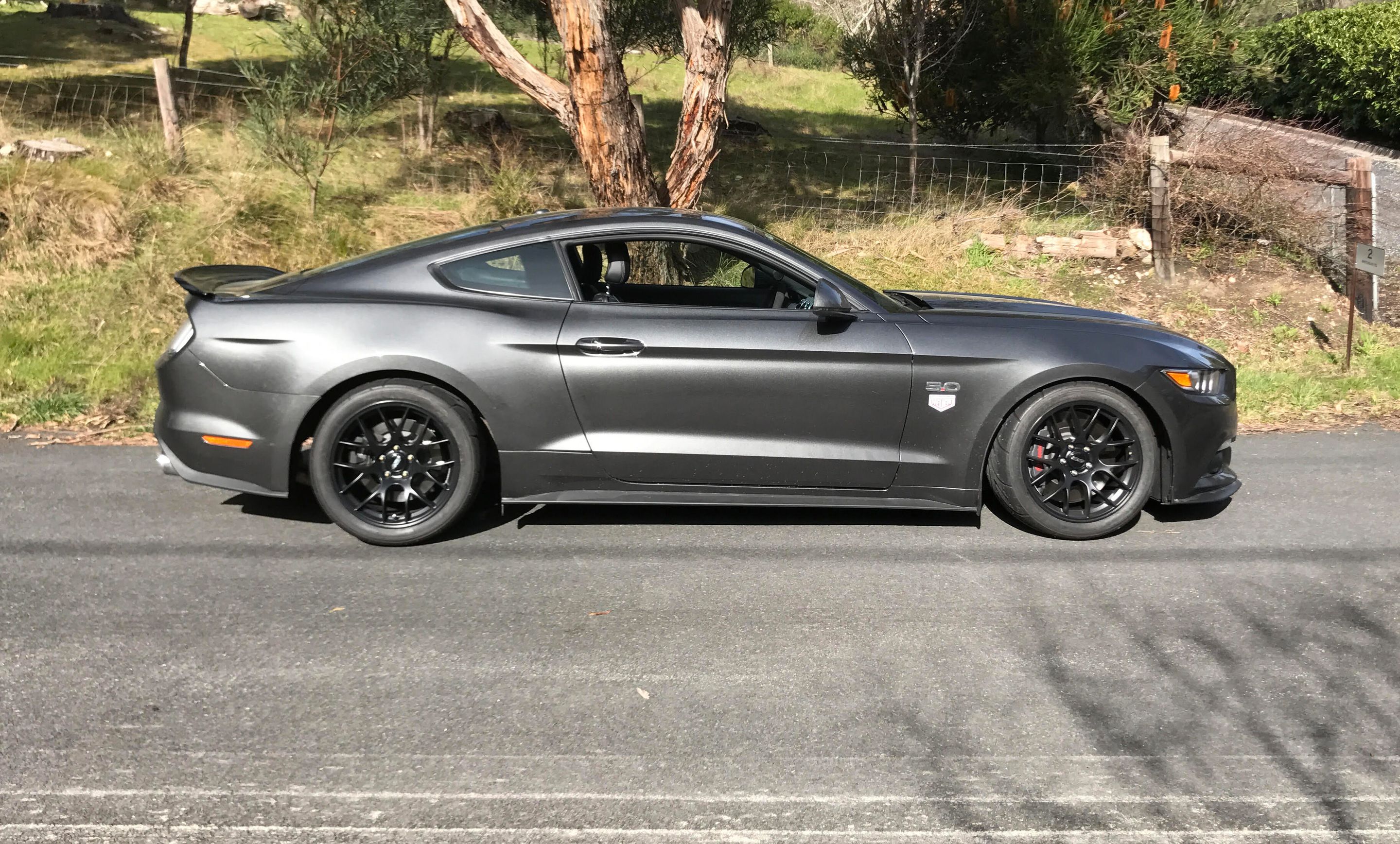 Grey Ford S550 Mustang GT with 18" EC-7 Apex wheels in Satin Black