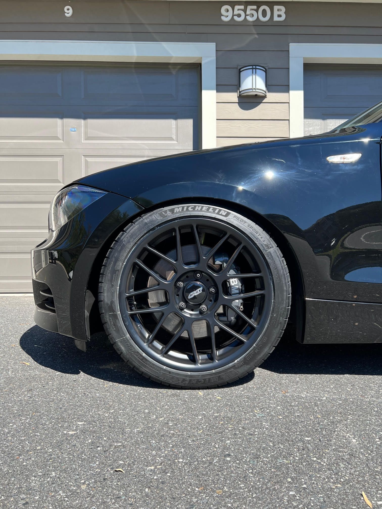 Black BMW E82 Coupe 1 Series with 18" ARC-8 Apex wheels in Satin Black