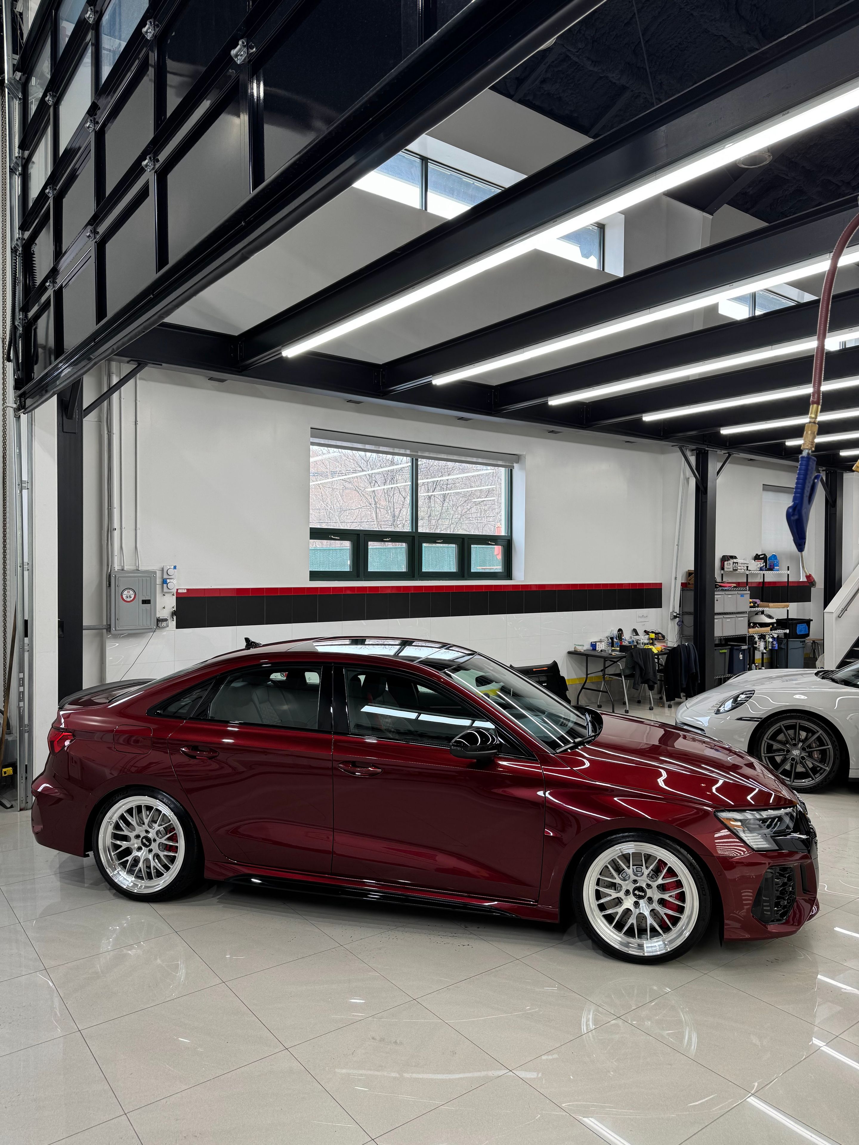 Red Audi 8Y RS 3 with 19" ML-10RT Apex wheels in Machined Lip Brushed Clear