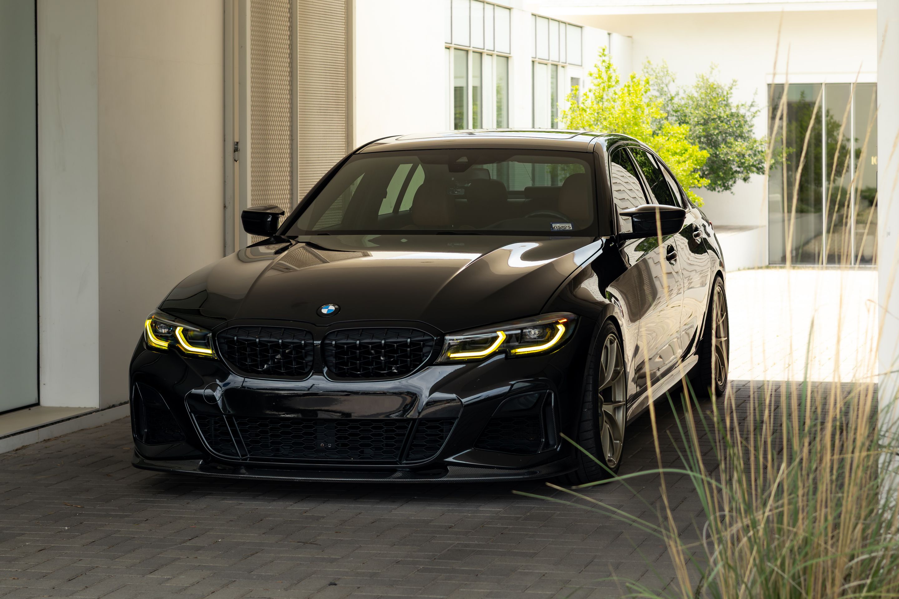 Black BMW G20 Sedan 3 Series with 19" VS-5RS Apex wheels in Motorsport Gold