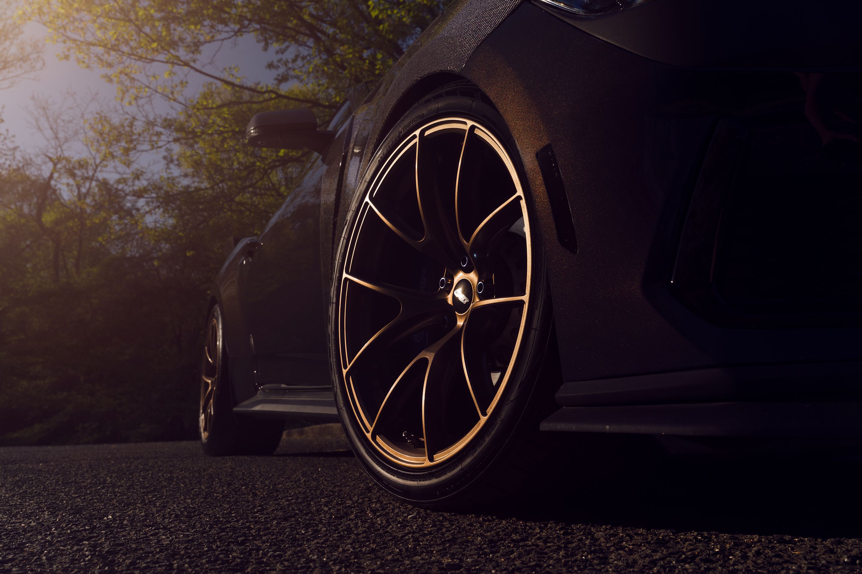 Orange Ford S650 Mustang Dark Horse with 20" VS-5RS Apex wheels in Satin Bronze