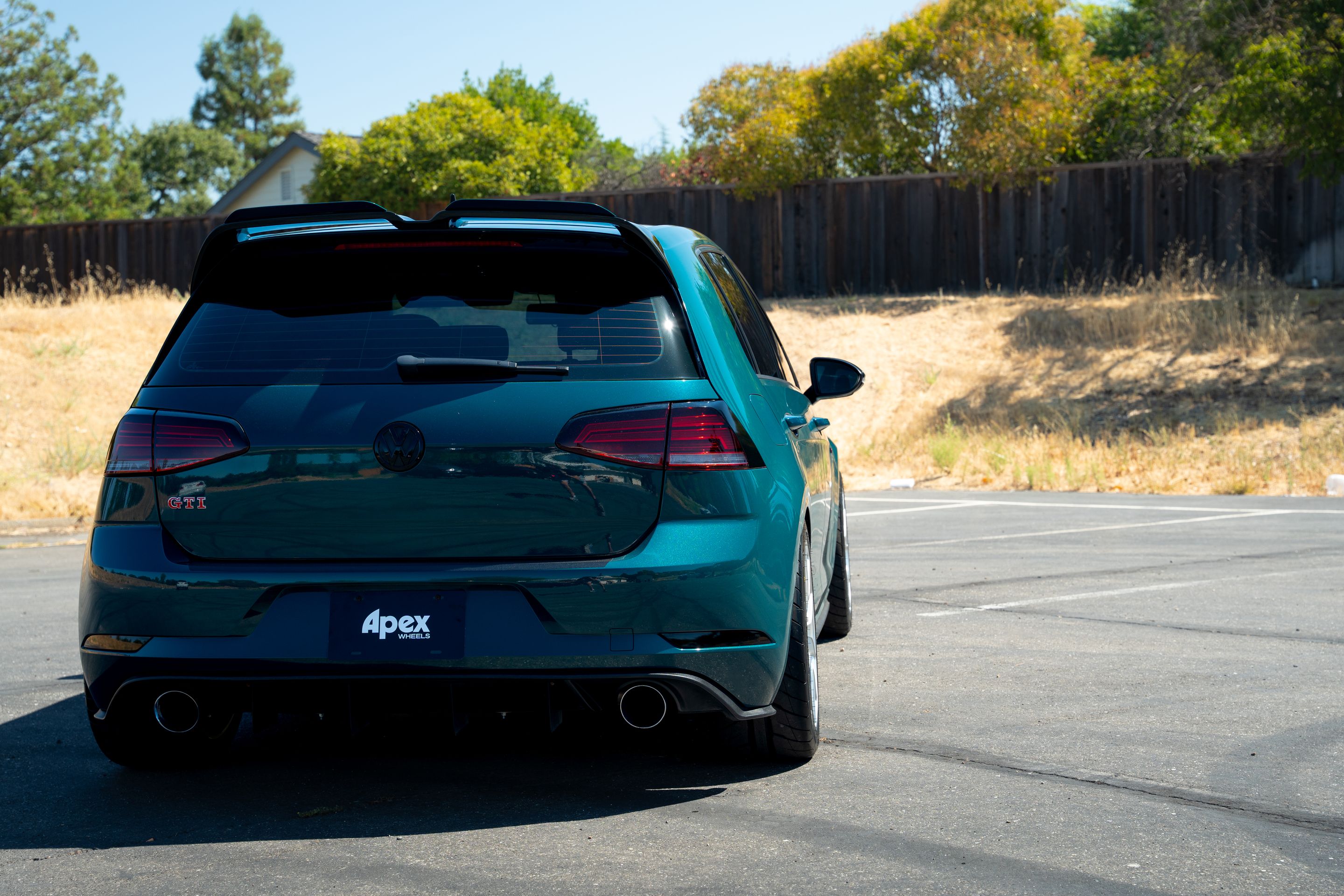 Green VW MK7 GTI with 17" VS-5RS Apex wheels in Brushed Clear