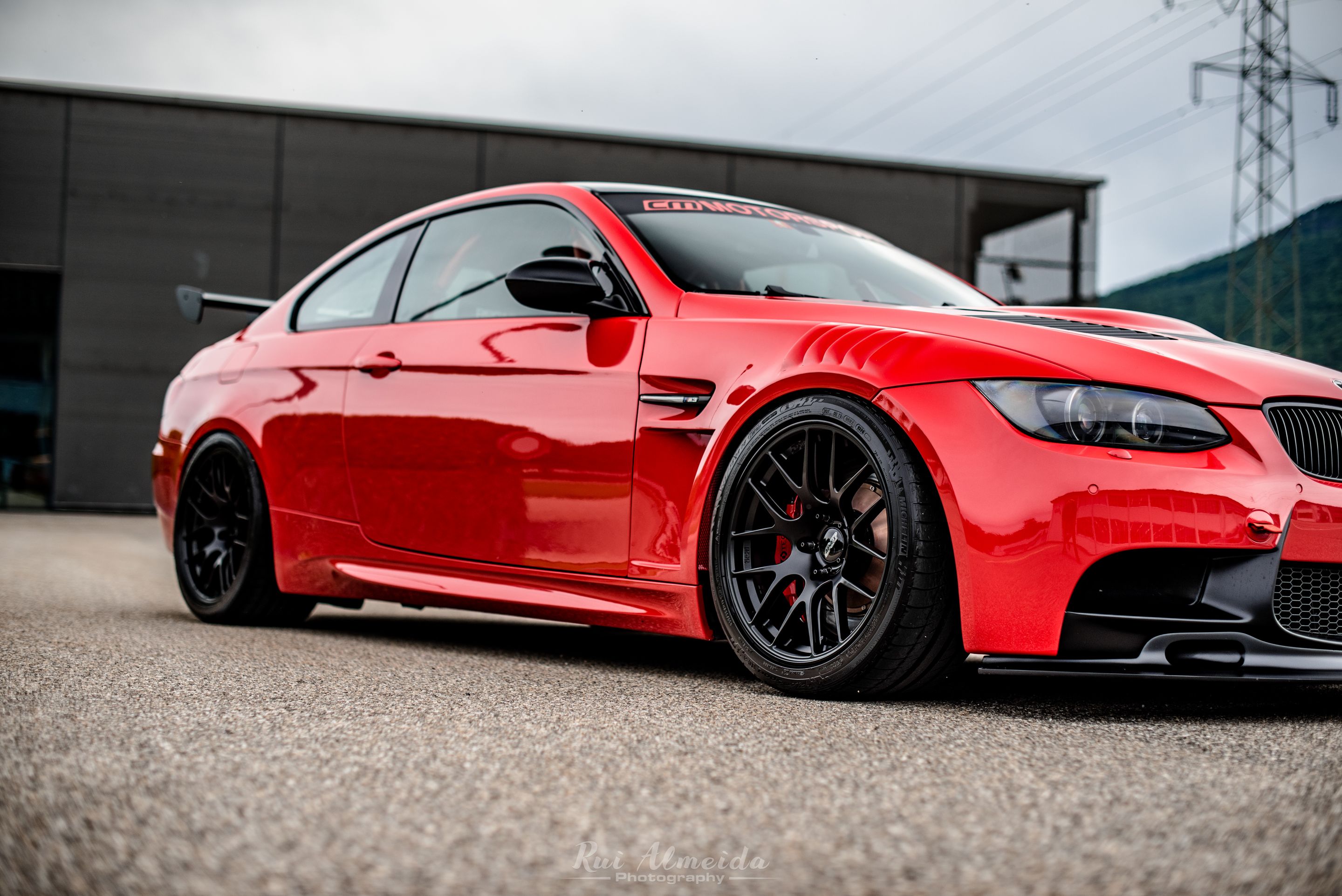 Red BMW E92 Coupe M3 with 18" EC-7R Apex wheels in Satin Black