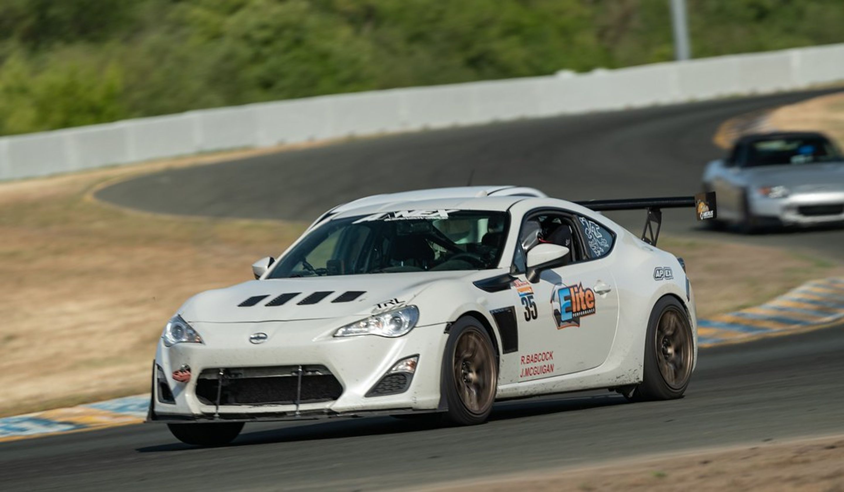 White Scion FR-S with 17" EC-7R Apex wheels in Satin Bronze