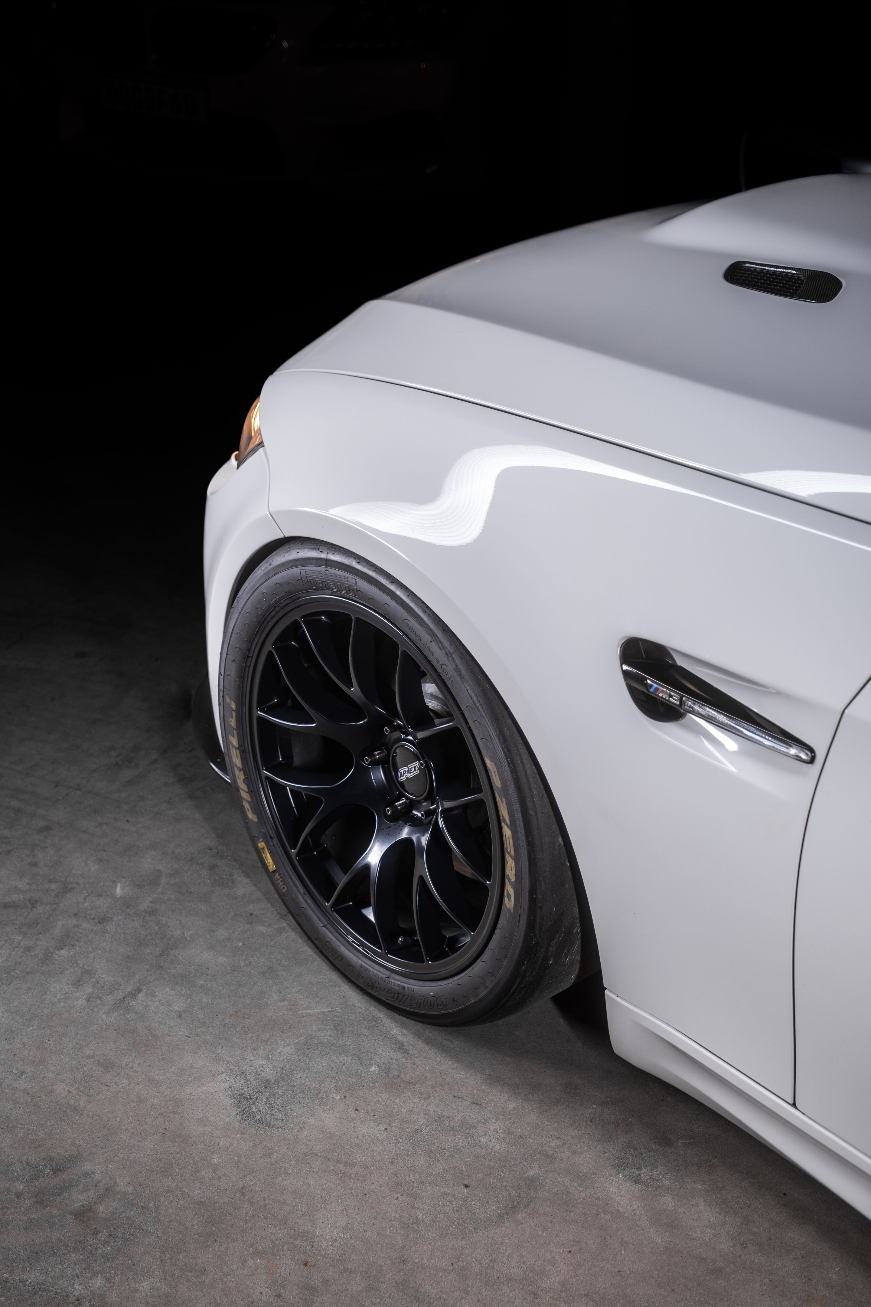 White BMW E92 Coupe M3 with 18" EC-7 Apex wheels in Satin Black