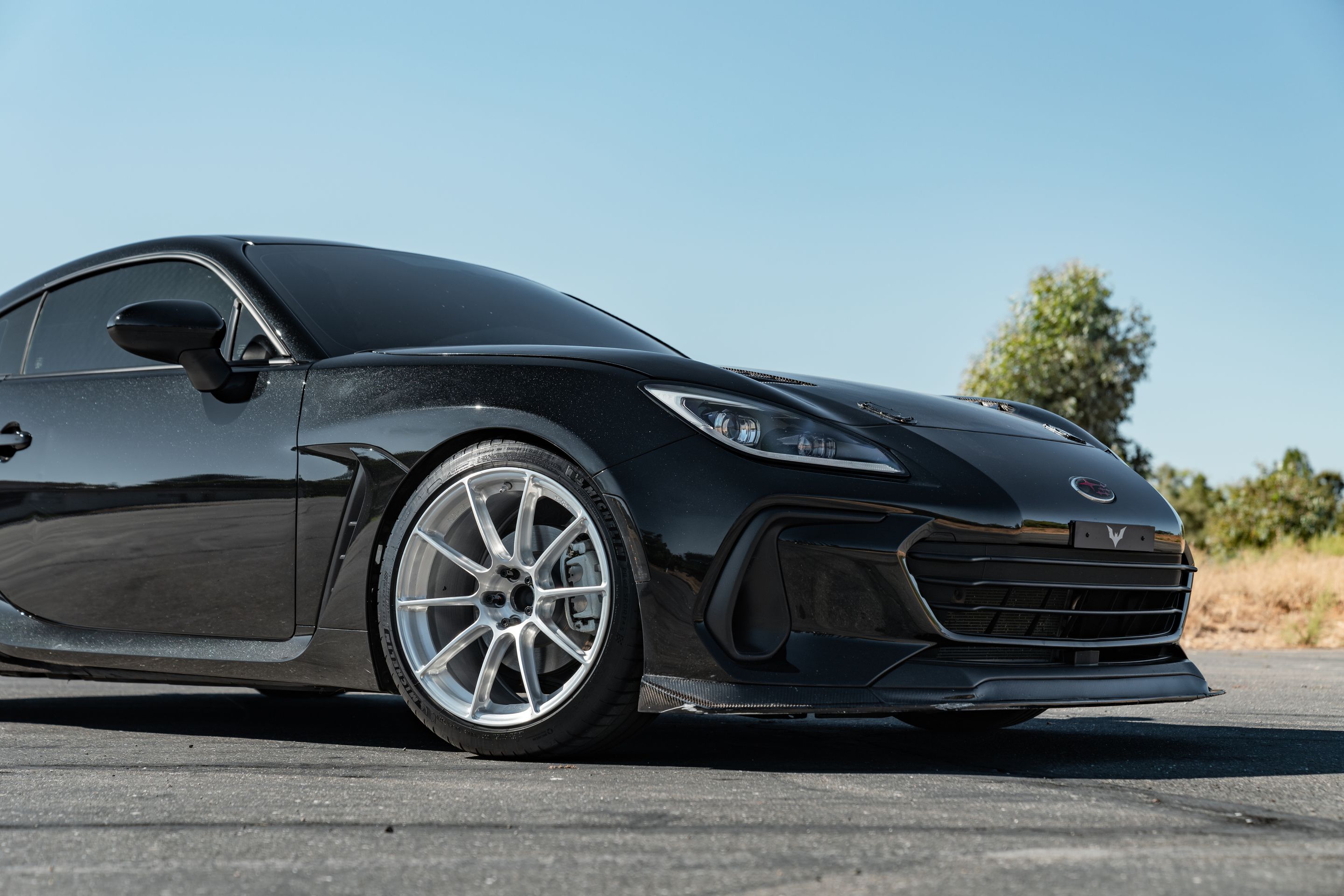 Black Subaru ZD8 / Gen 2 BRZ with 18" SM-10RS Apex wheels in Brushed Clear