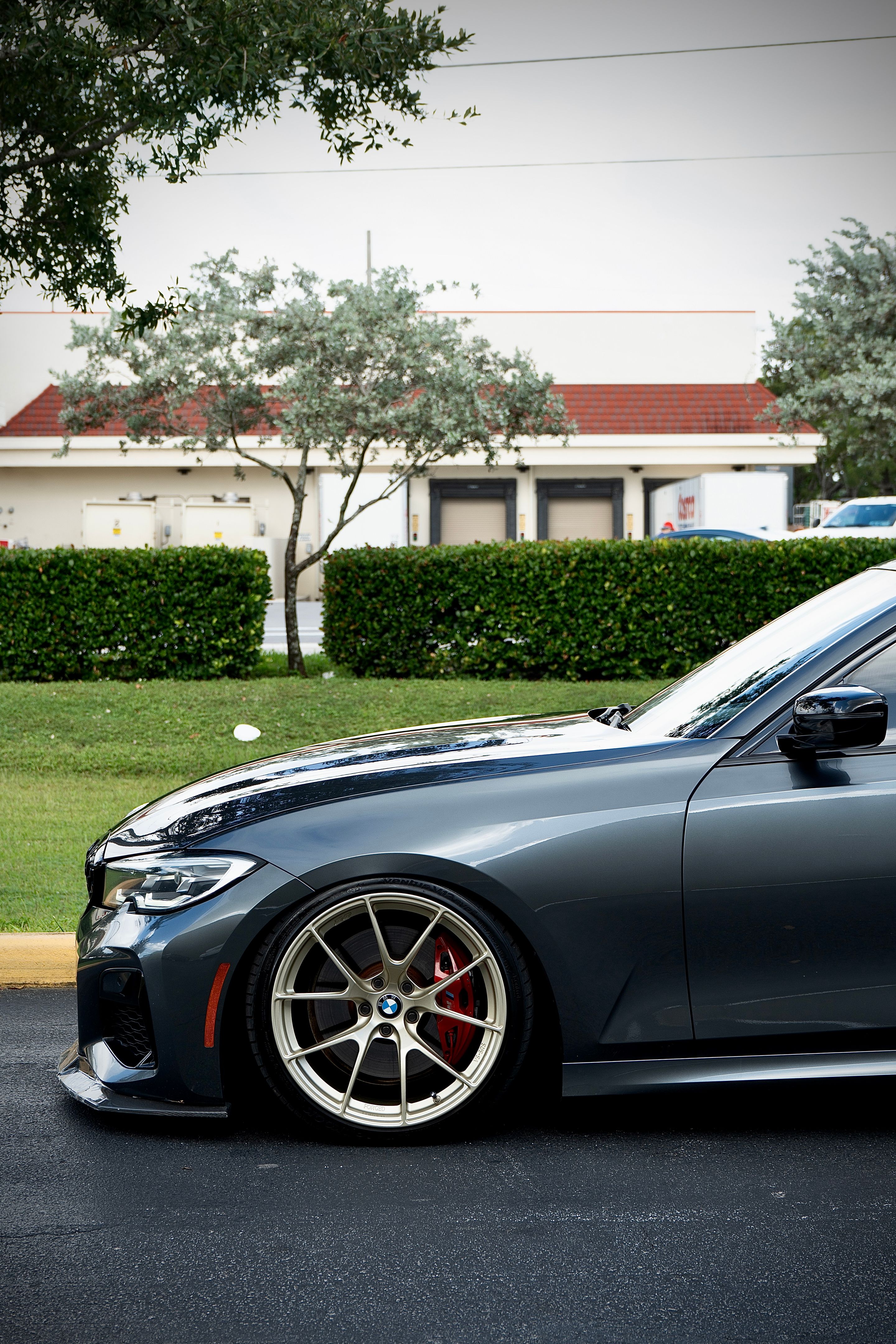 Grey BMW G20 Sedan 3 Series with 19" VS-5RS Apex wheels in Motorsport Gold