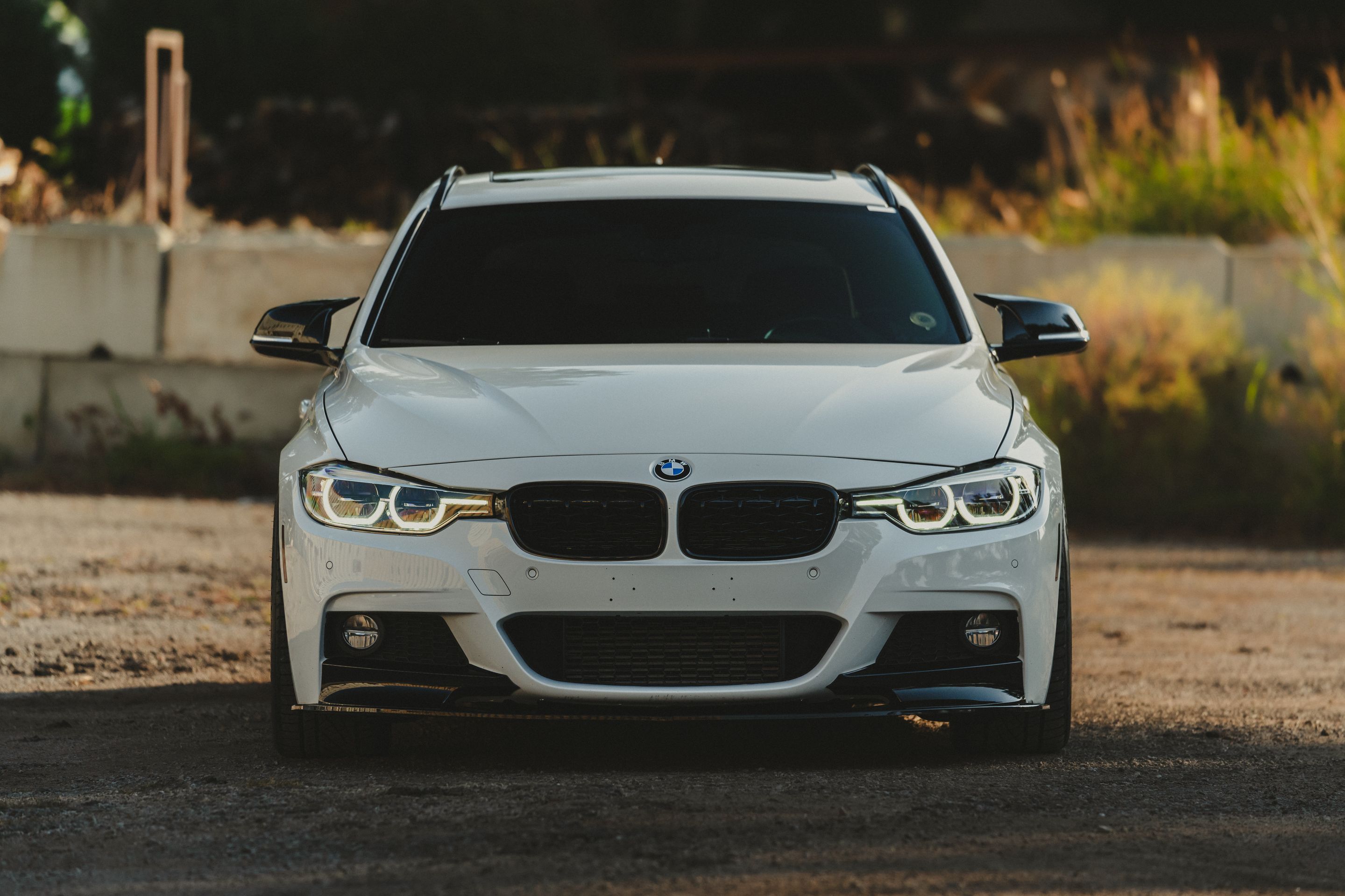 White BMW F31 Wagon 3 Series with 18" ARC-8 Apex wheels in Race Silver