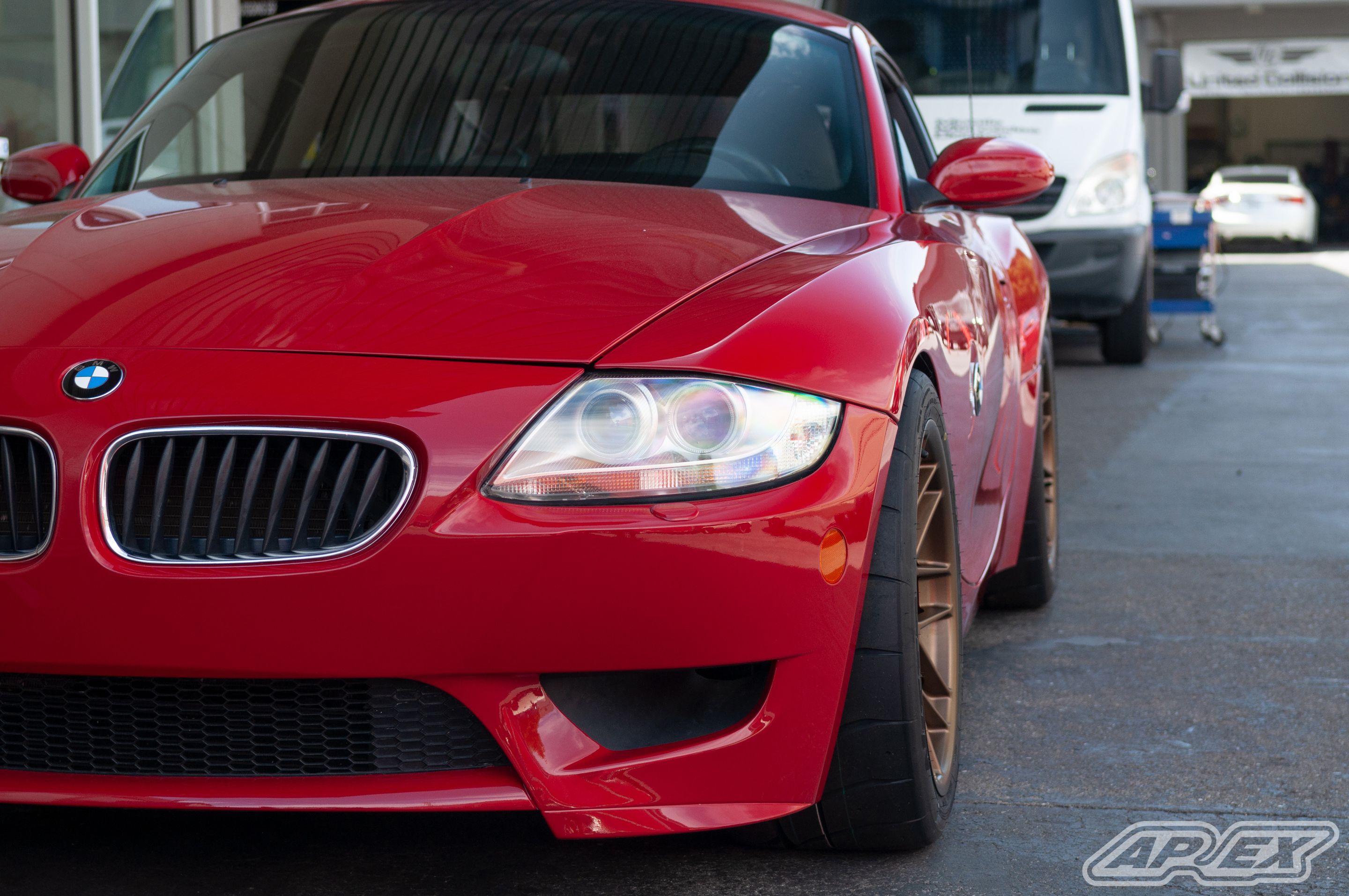 Red BMW E86 Coupe Z4 M with 18" ARC-8 Apex wheels in Satin Bronze