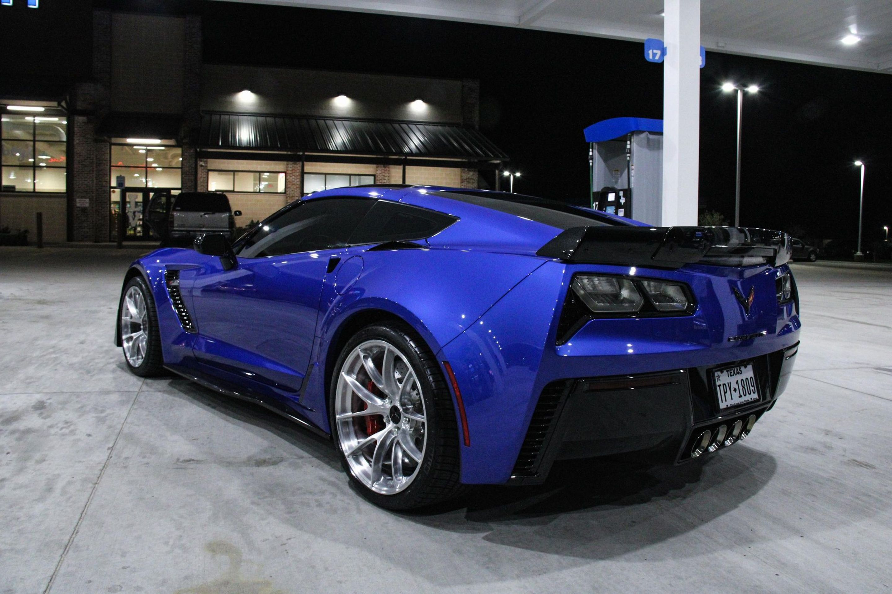Blue Chevrolet C7 Corvette Z06 with 19"/20" VS-5RS Apex wheels in Brushed Clear