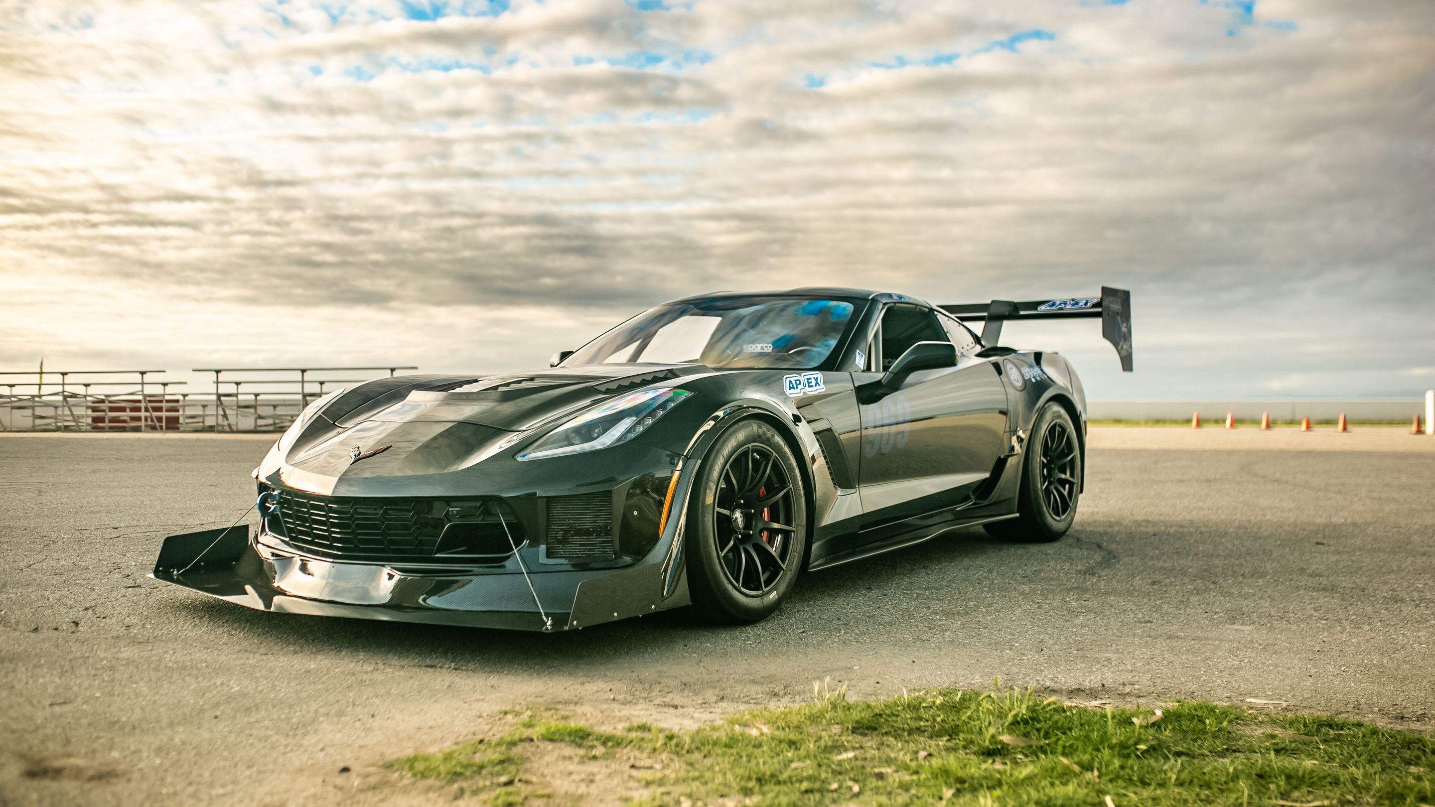 Black Chevrolet C7 Corvette Z06 with 18" SM-10 Apex wheels in Satin Black