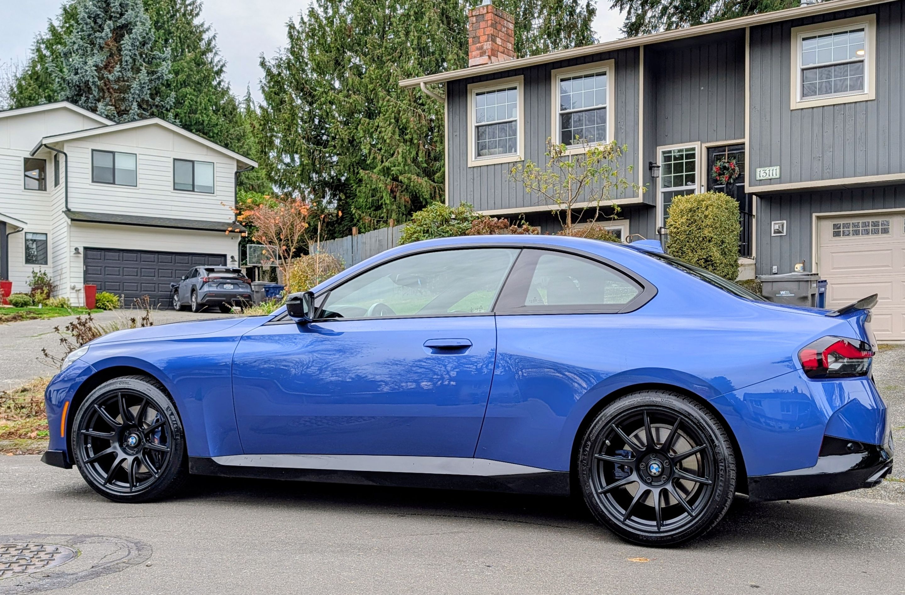 Blue BMW G42 2 Series with 19" SM-10 Apex wheels in Satin Black