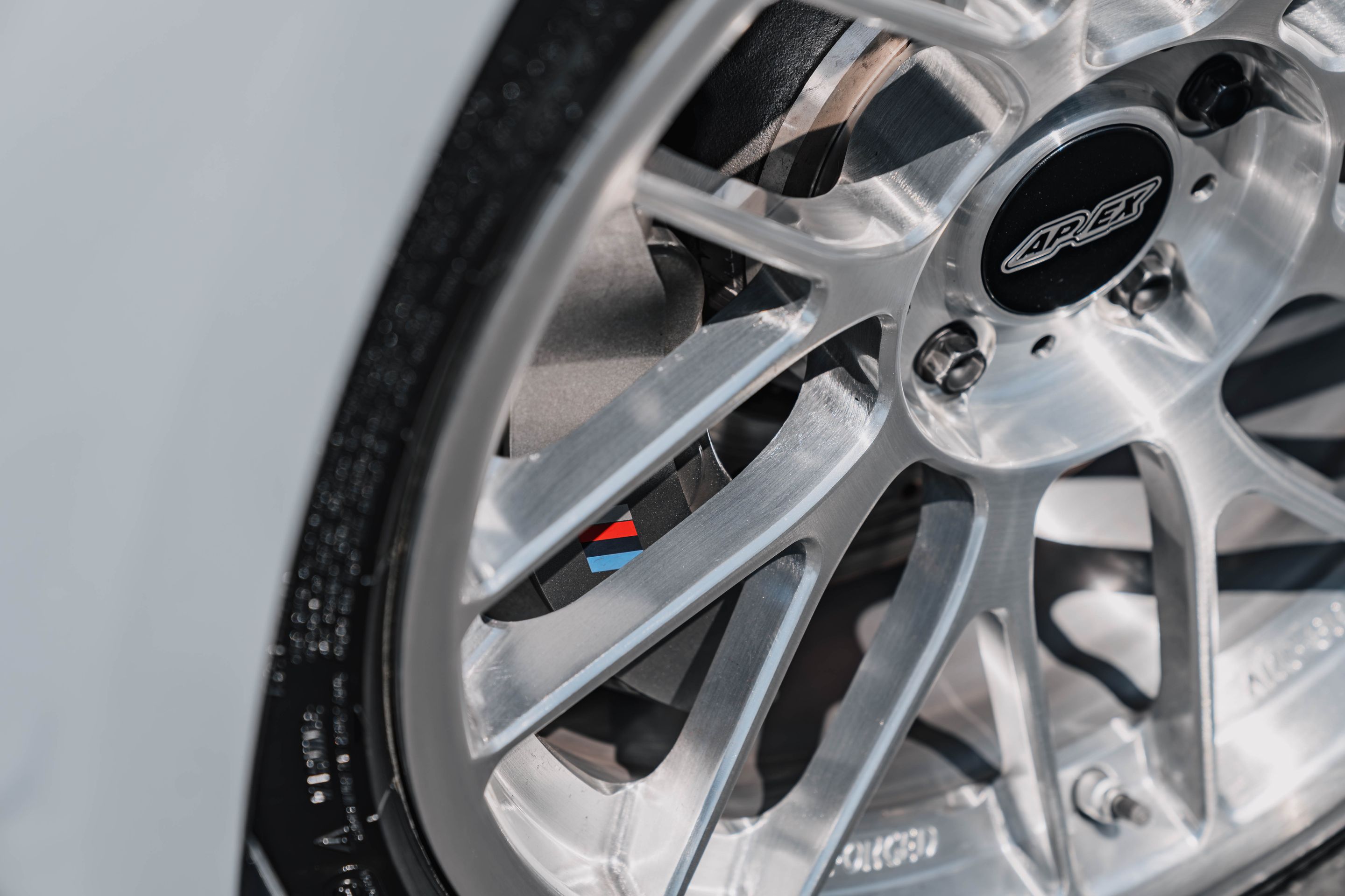 Silver BMW F87 M2 with 19" ARC-8RT Apex wheels in Brushed Clear