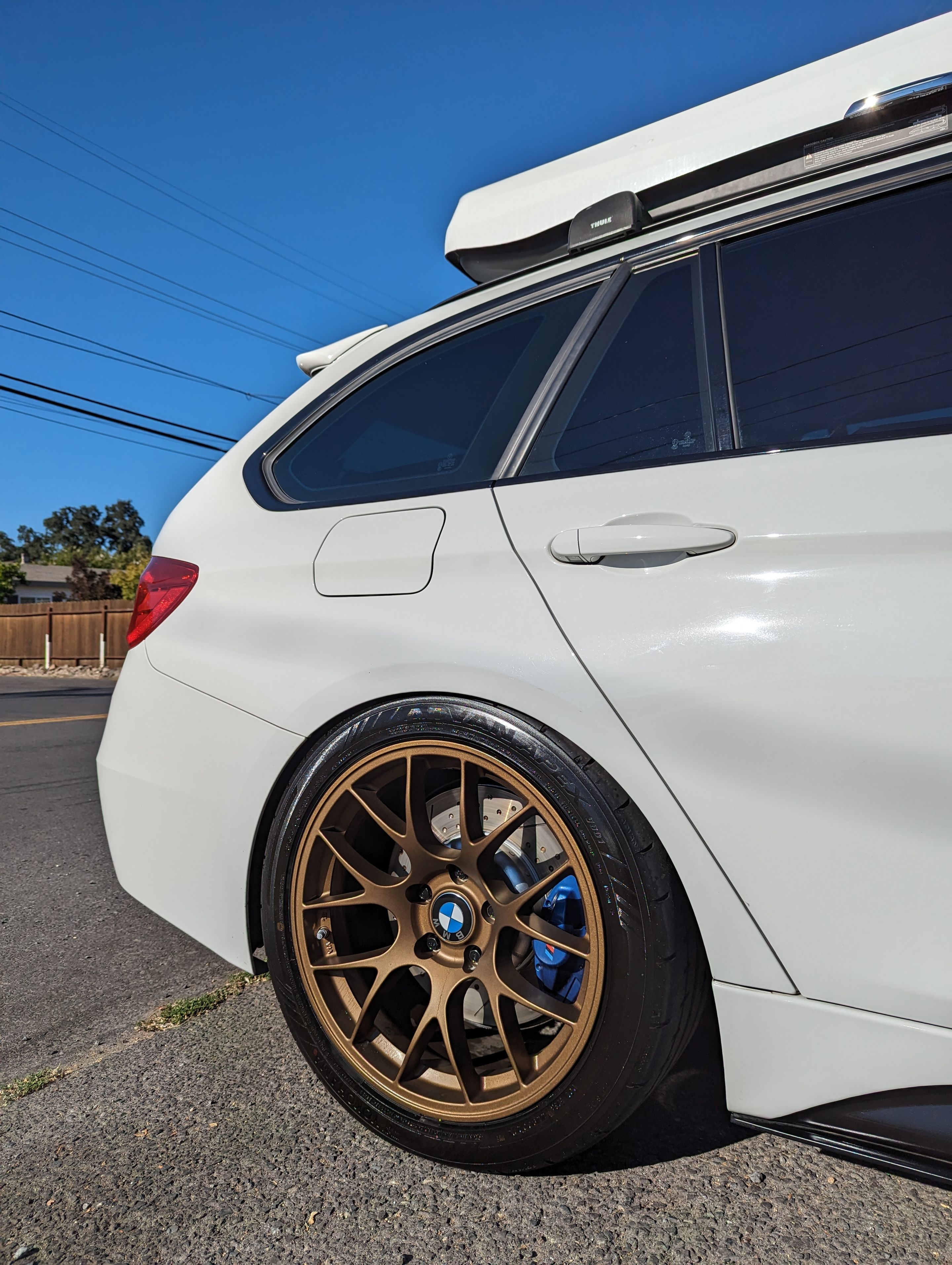 White BMW F31 Wagon 3 Series with 18" EC-7 Apex wheels in Satin Bronze