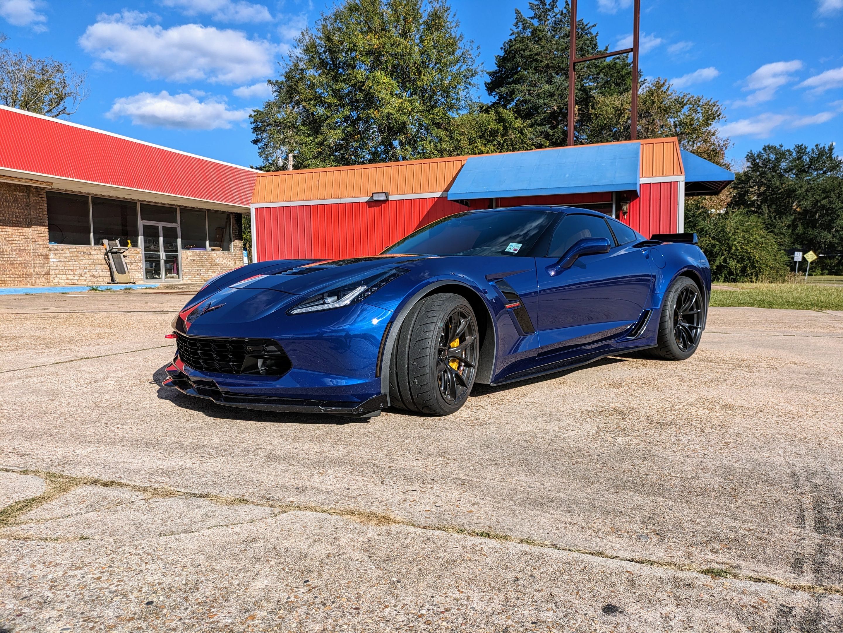 Blue Chevrolet C7 Corvette Grand Sport with 18"/19" VS-5RS Apex wheels in Satin Black
