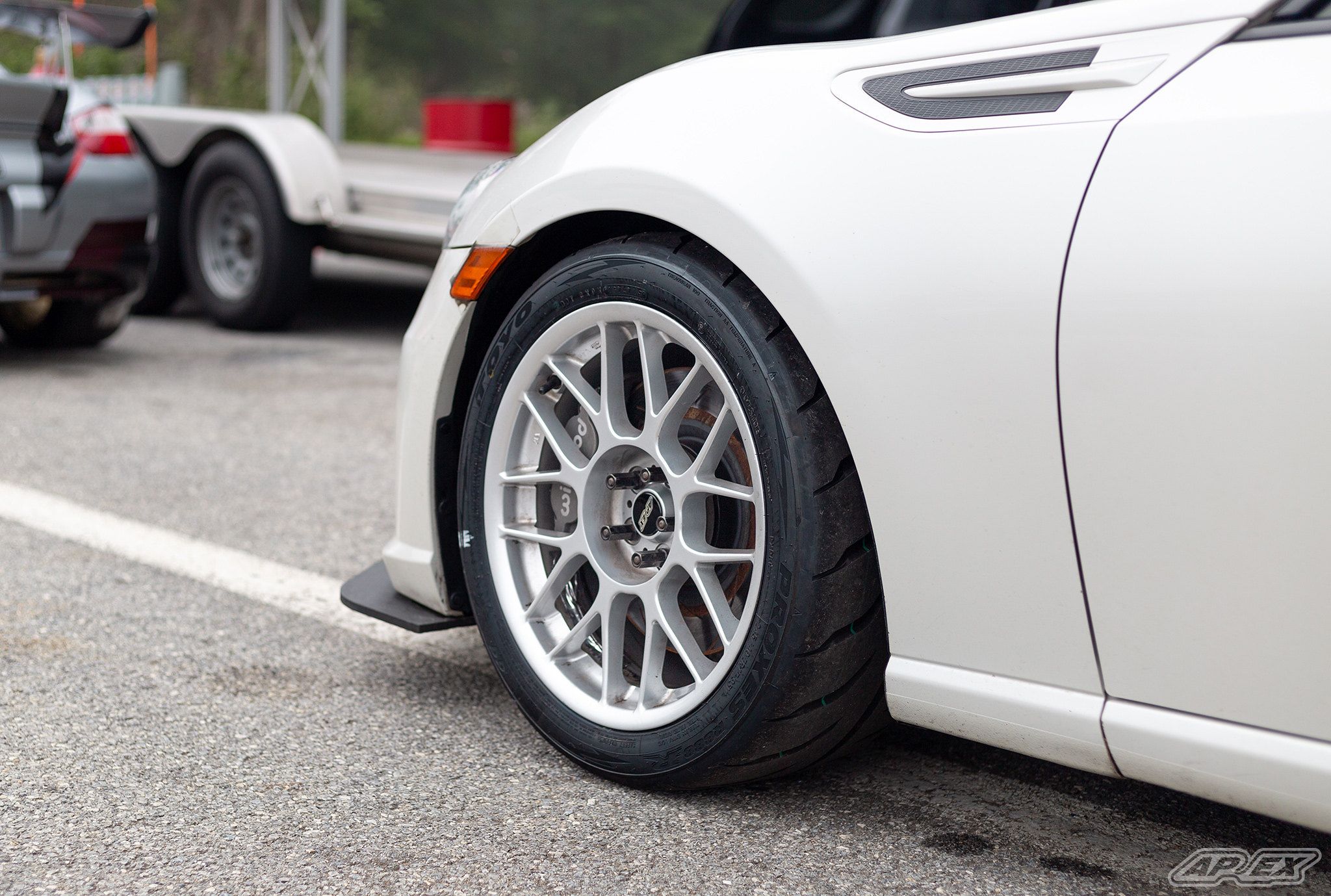 White Subaru ZC6 / Gen 1 BRZ with 17" ARC-8 Apex wheels in Race Silver
