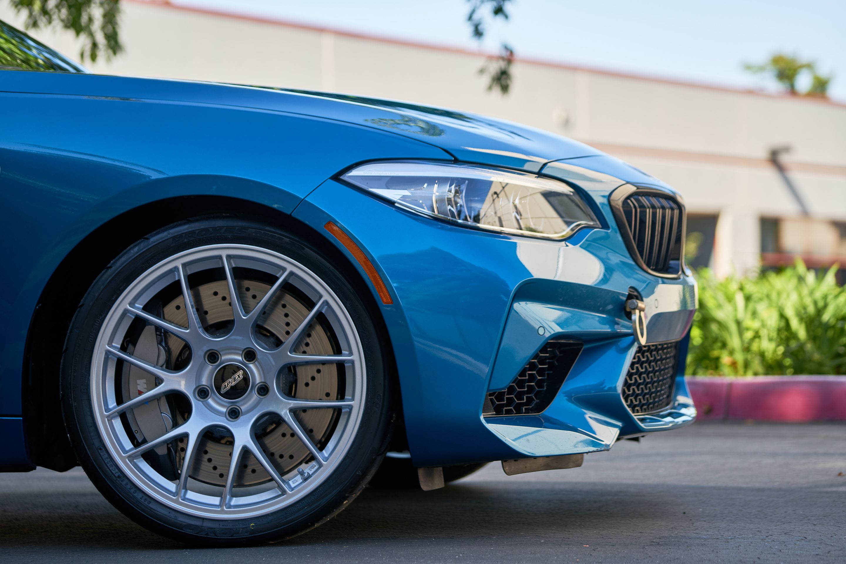 Blue BMW F87 M2 with 19" EC-7 Apex wheels in Race Silver