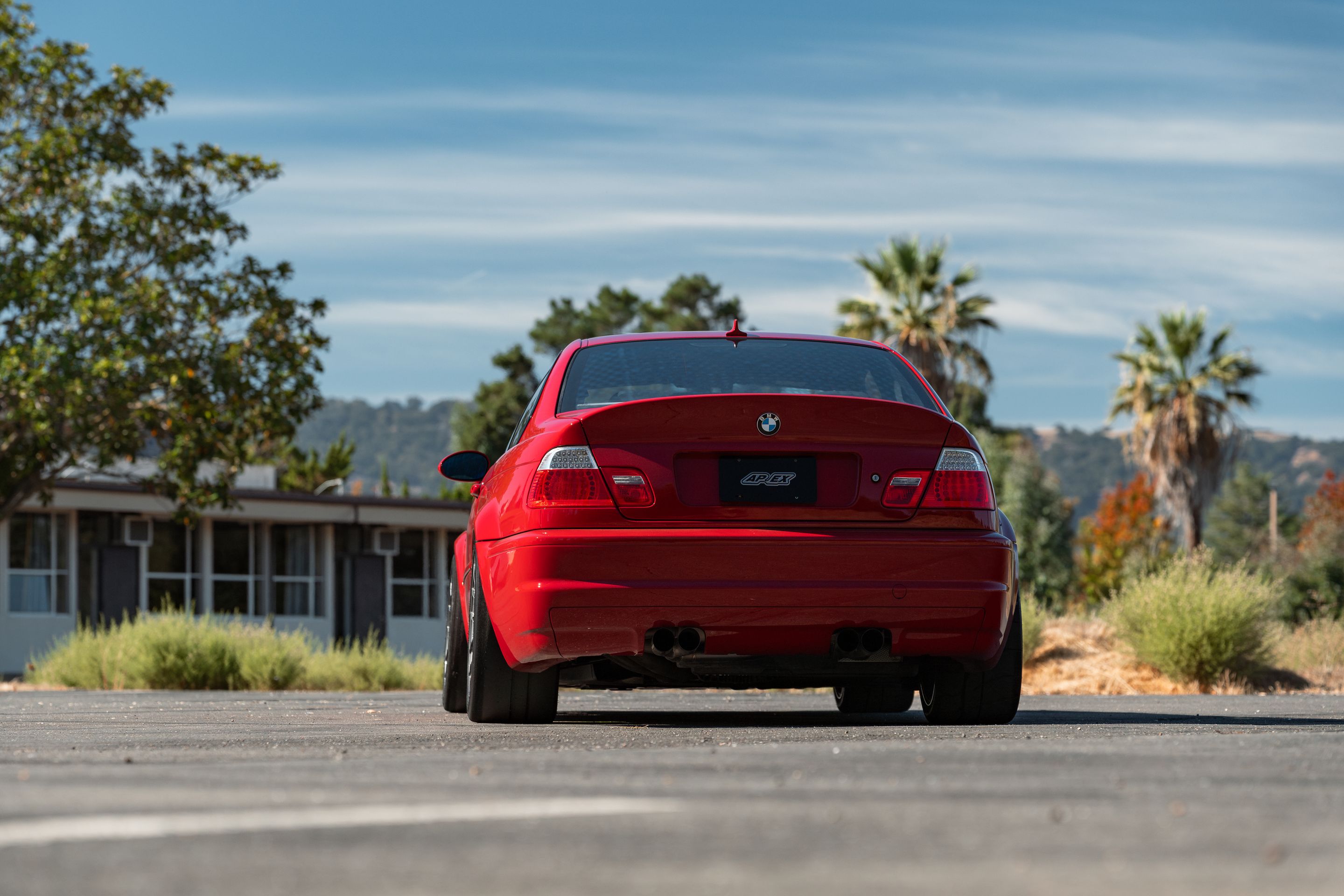 Red BMW E46 M3 with 18" EC-7RS Apex wheels in Anthracite