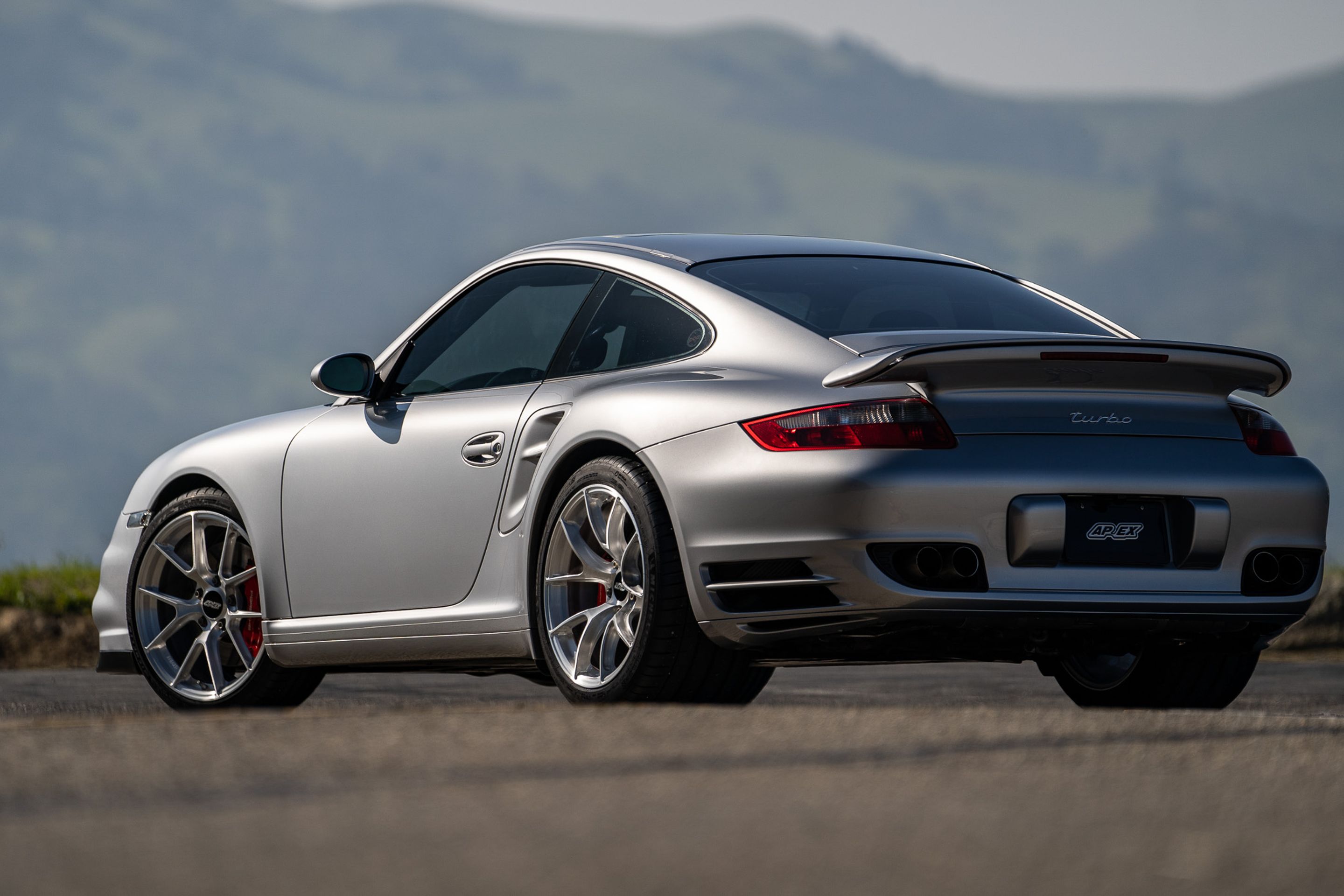 Silver Porsche 911 997 Turbo with 19" VS-5RS Apex wheels in Brushed Clear