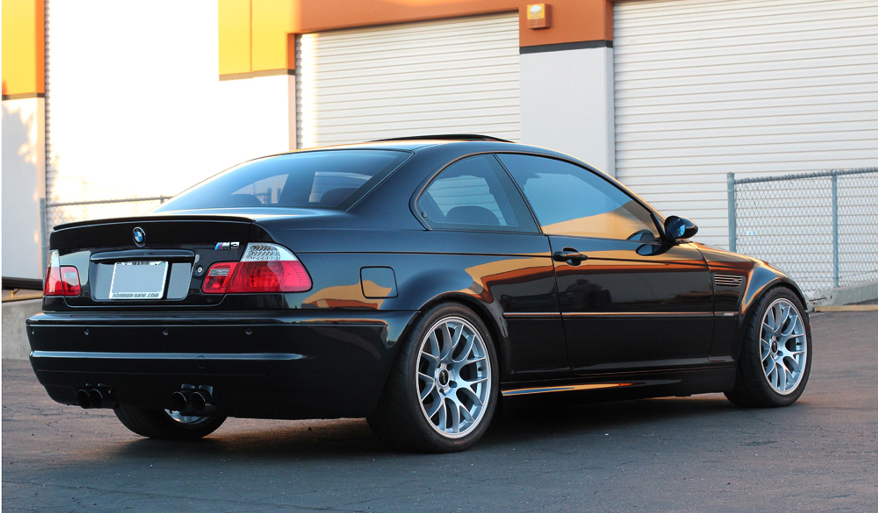 Black BMW E46 M3 with 18" EC-7 Apex wheels in Race Silver