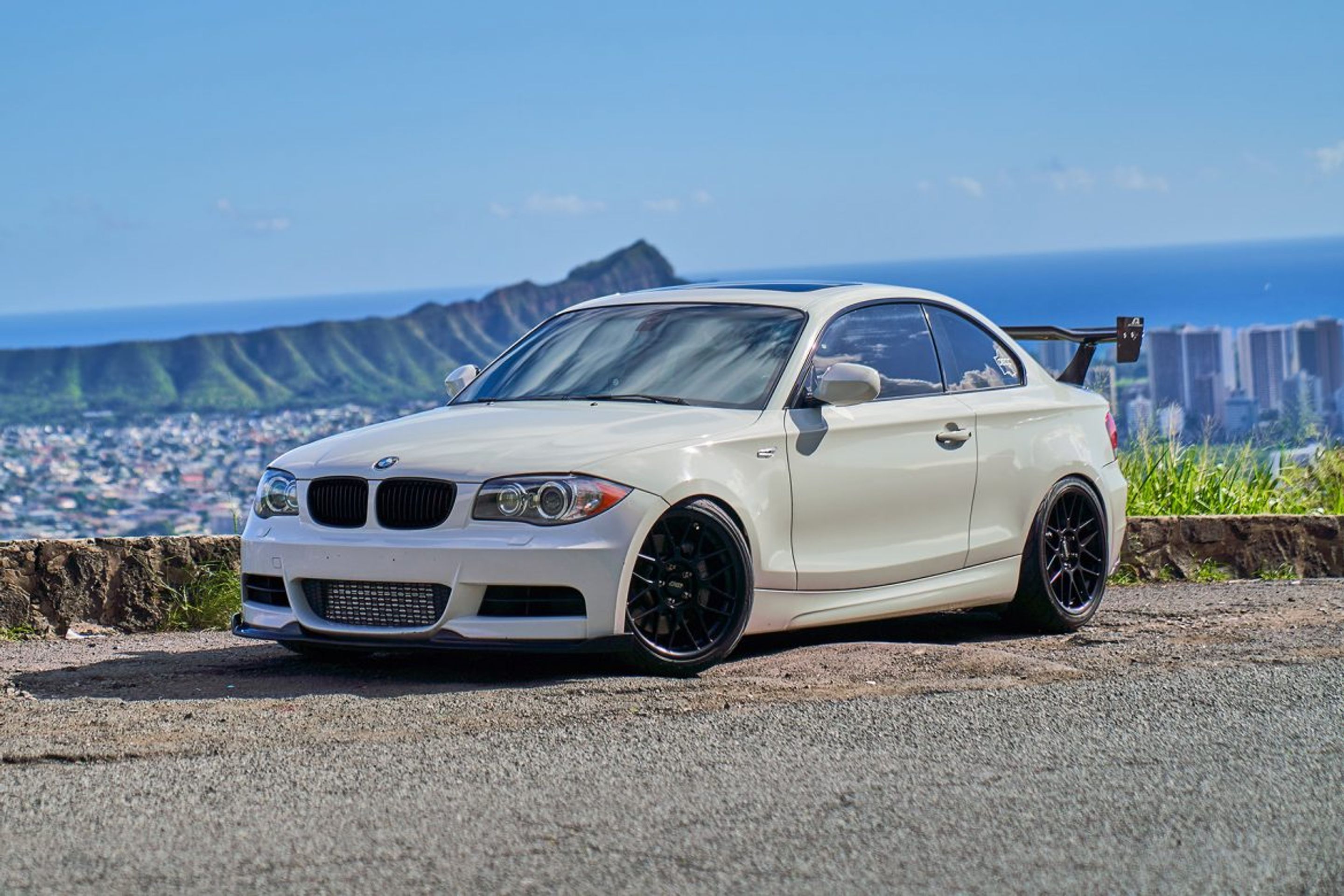White BMW E82 Coupe 1 Series with 18" ARC-8 Apex wheels in Satin Black