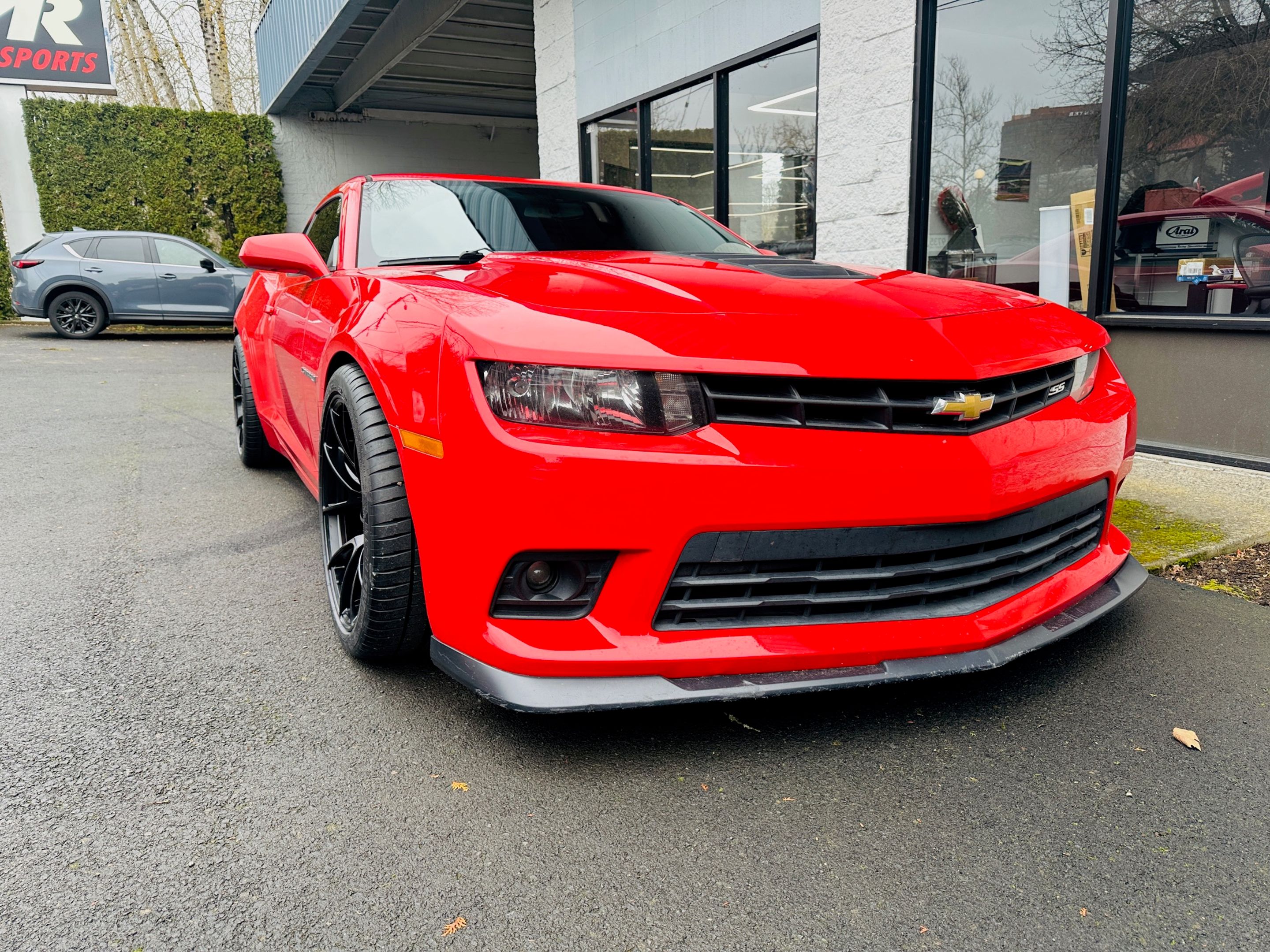 Red Chevrolet 5th Gen Camaro SS 1LE with 19" VS-5RS Apex wheels in Satin Black