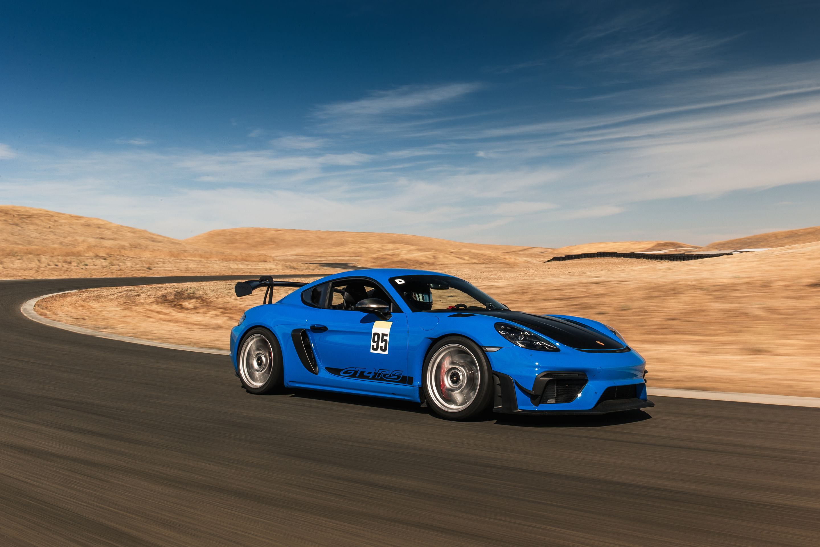Blue Porsche 718 Cayman GT4 RS with 19" EC-7RS Apex wheels in Race Silver
