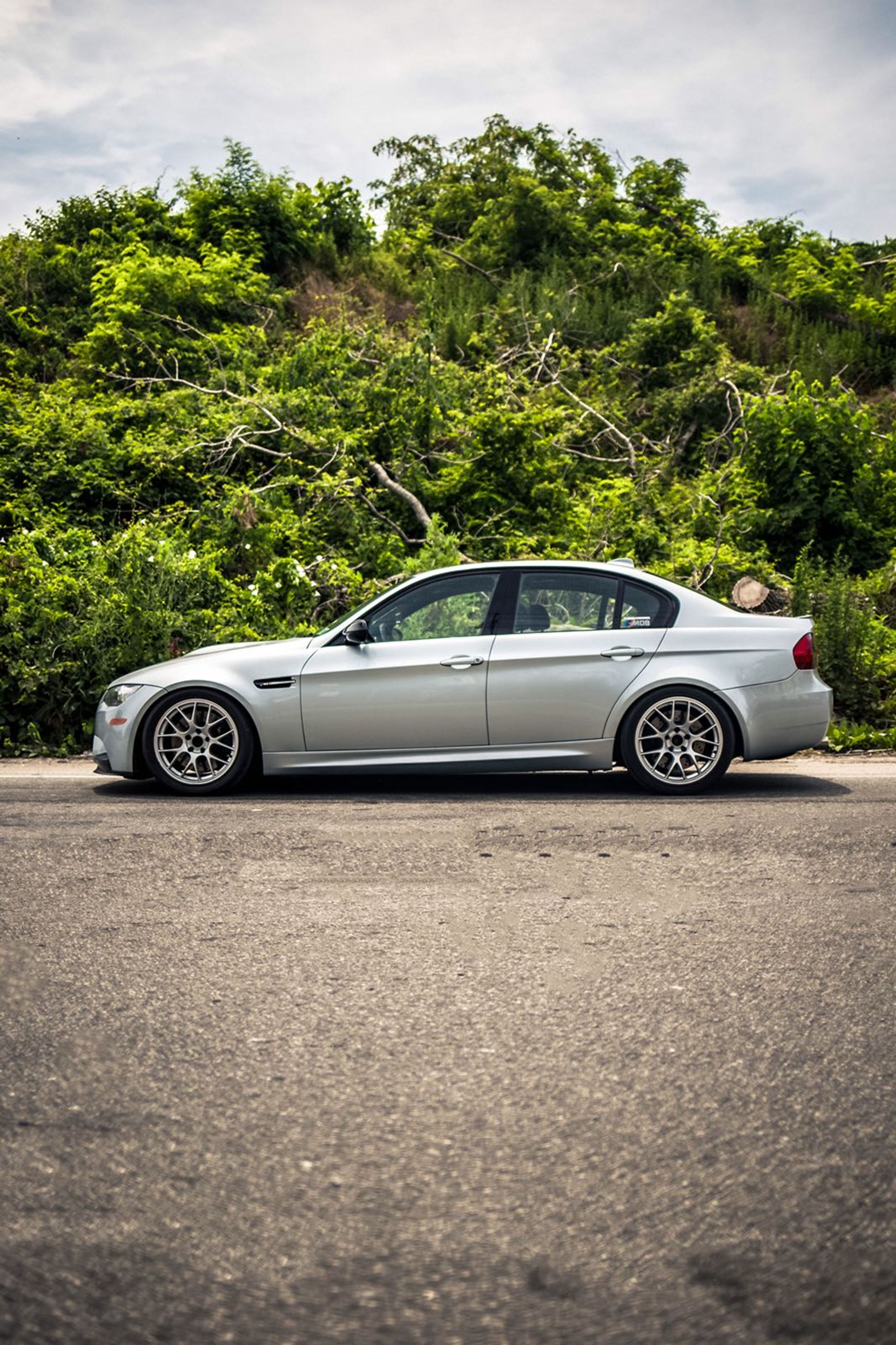 Silver BMW E90 Sedan M3 with 18" EC-7 Apex wheels in Satin Black