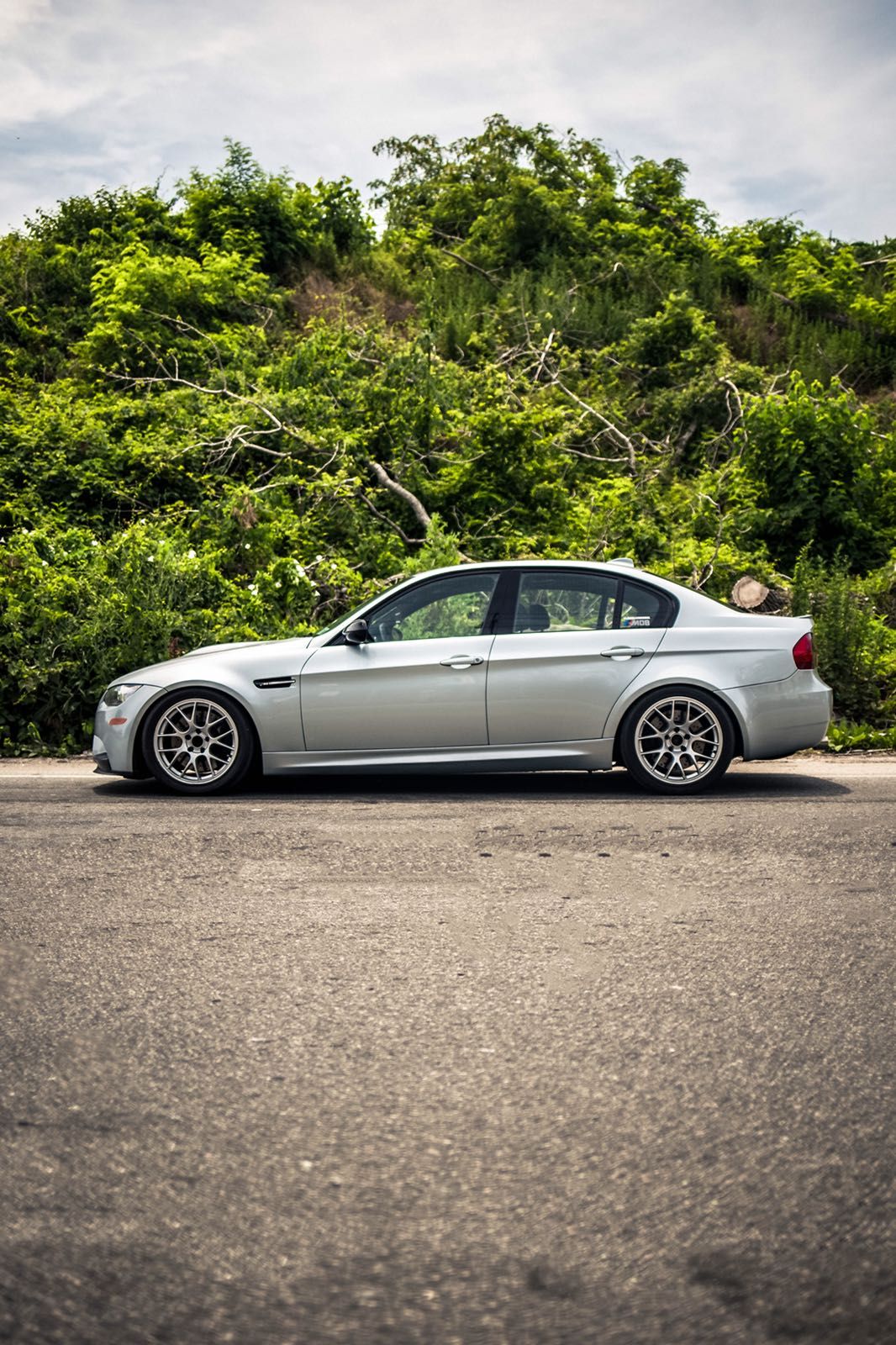 Silver BMW E90 Sedan M3 with 18" EC-7 Apex wheels in Satin Black