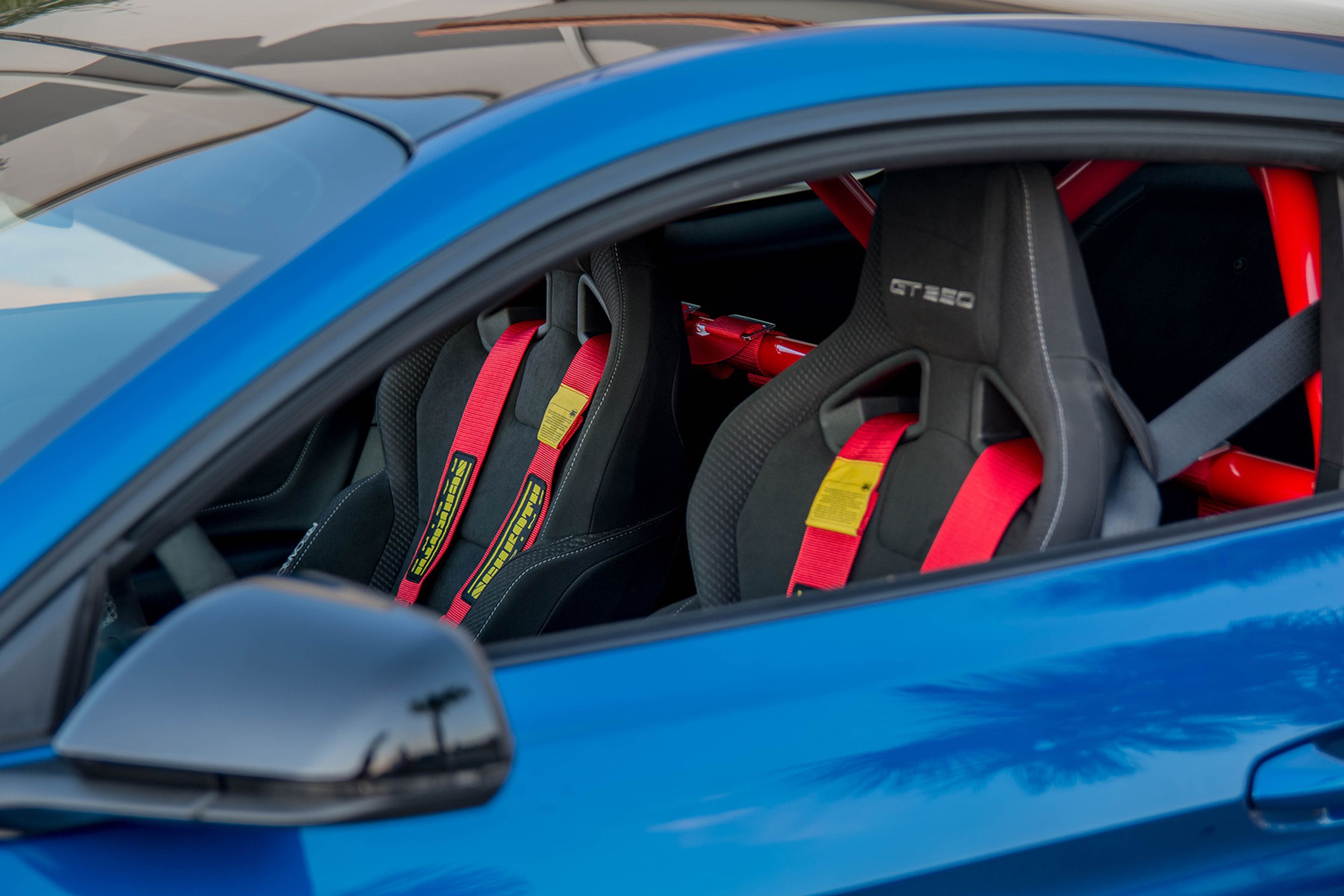 Blue Ford S550 Mustang GT350 with 19" EC-7 Apex wheels in Satin Black